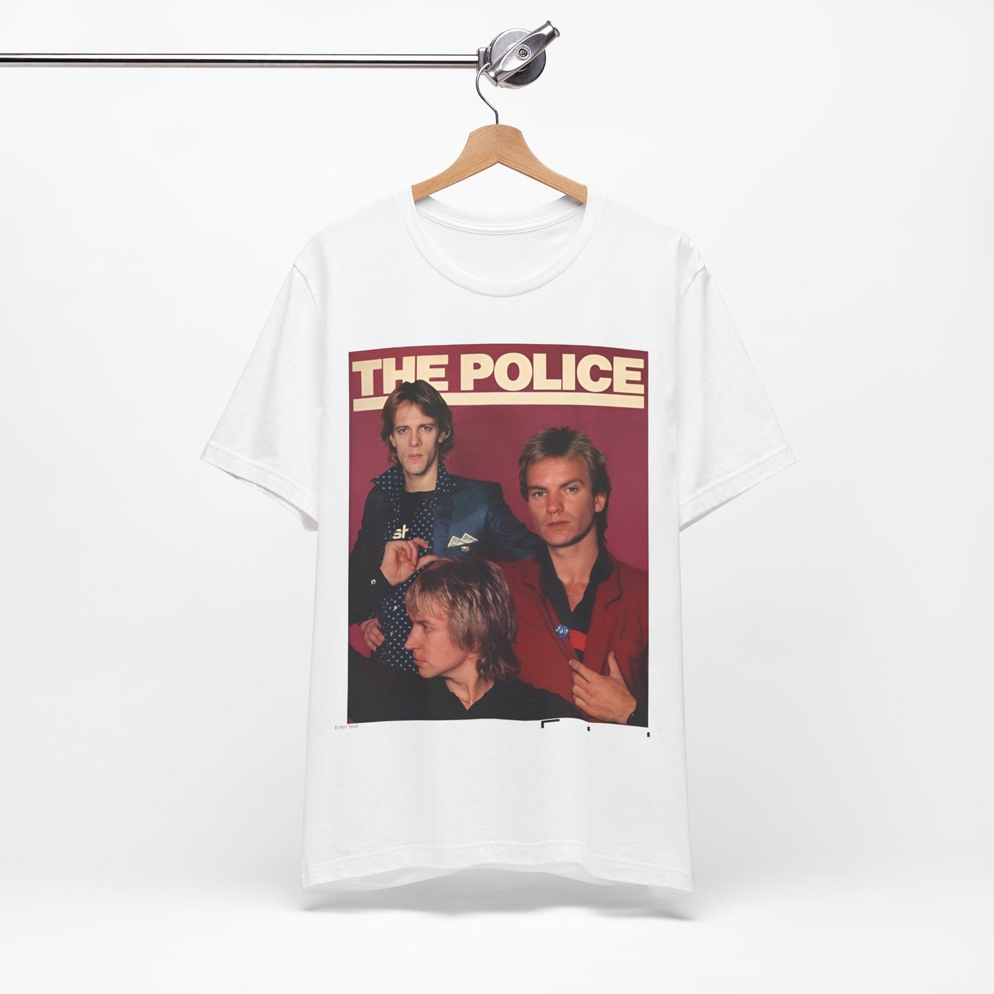 A black graphic t-shirt featuring a minimalist graphic of The Police as a power trio.