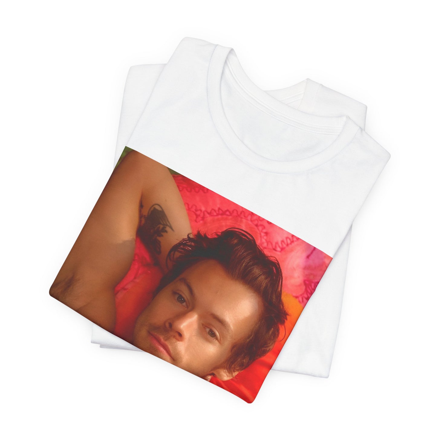 A black graphic t-shirt featuring a graphic of Harry Styles with a chill pop vibe.