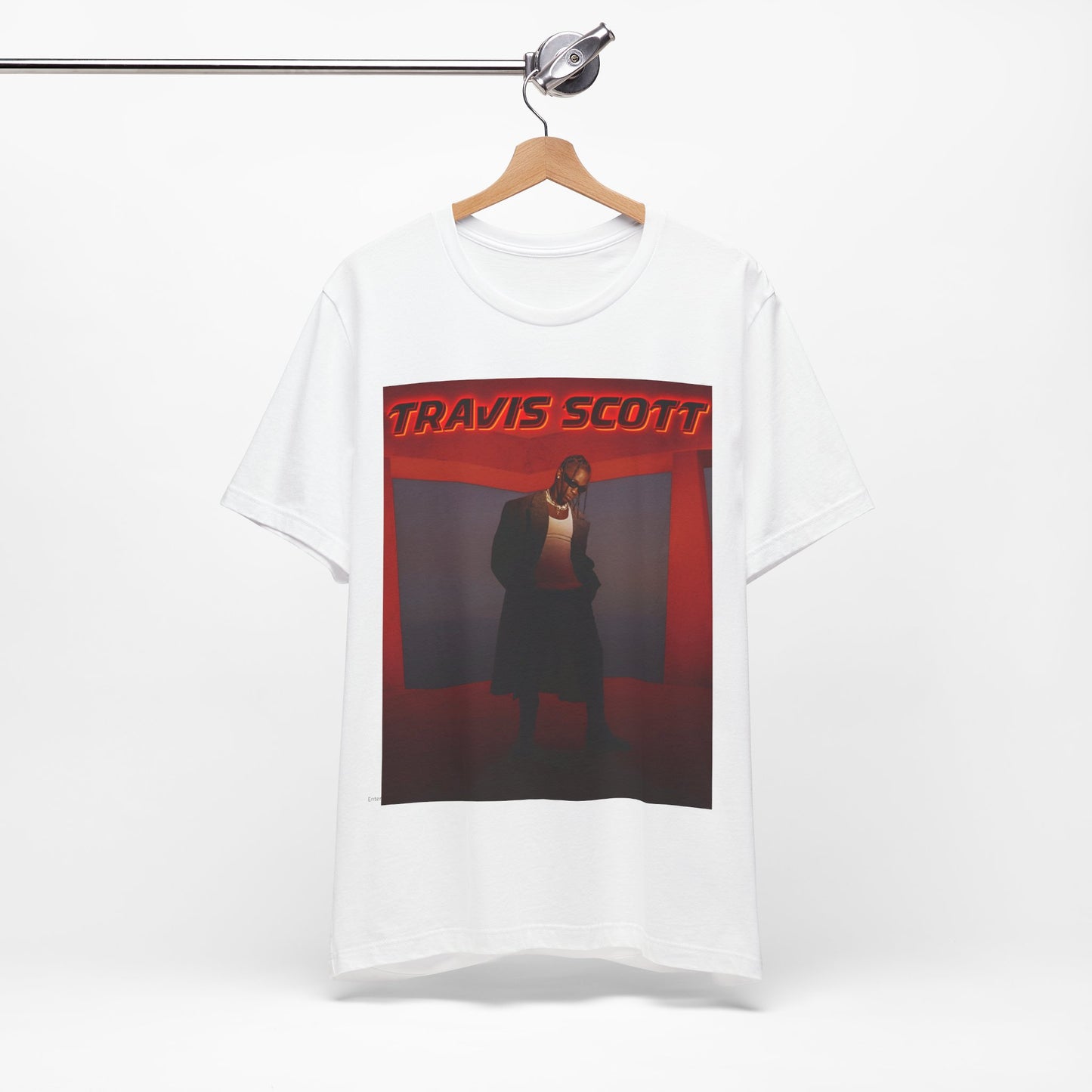 A black graphic t-shirt featuring a graphic of Travis Scott with a dreamy rap soundscape aesthetic.