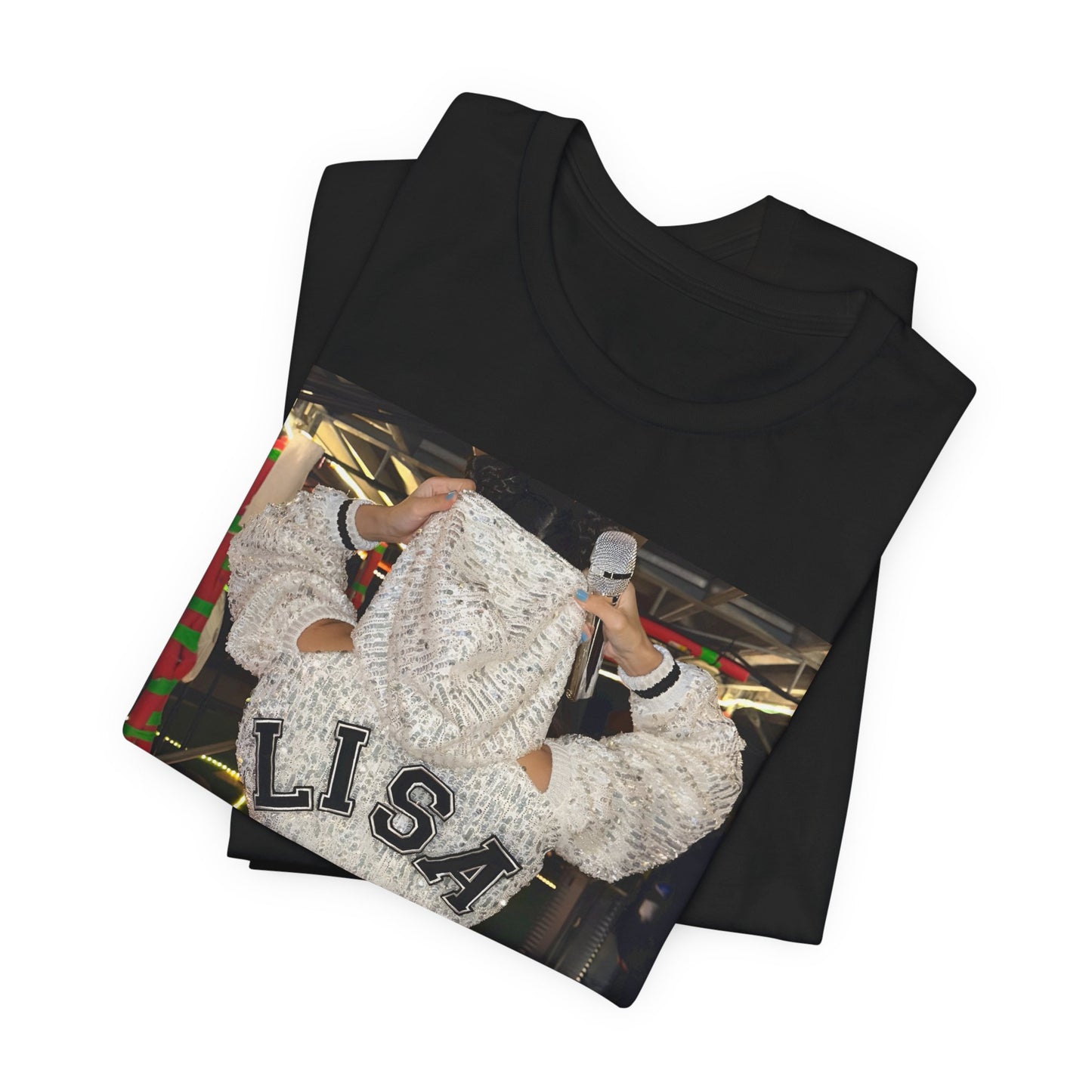 A black graphic t-shirt featuring a graphic or photo of Lisa in a backstage setting.