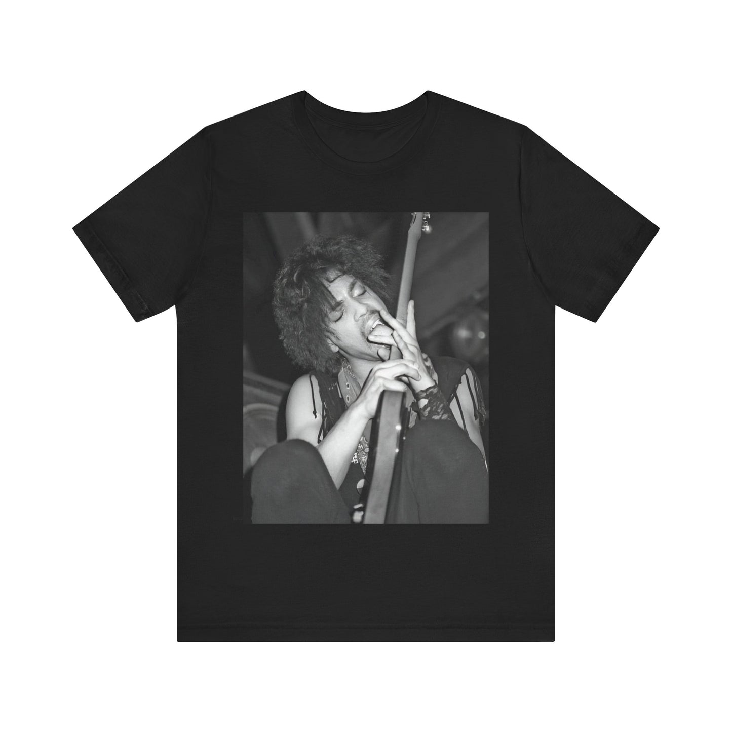 A black graphic t-shirt featuring a graphic or photo of Prince performing wildly on stage.