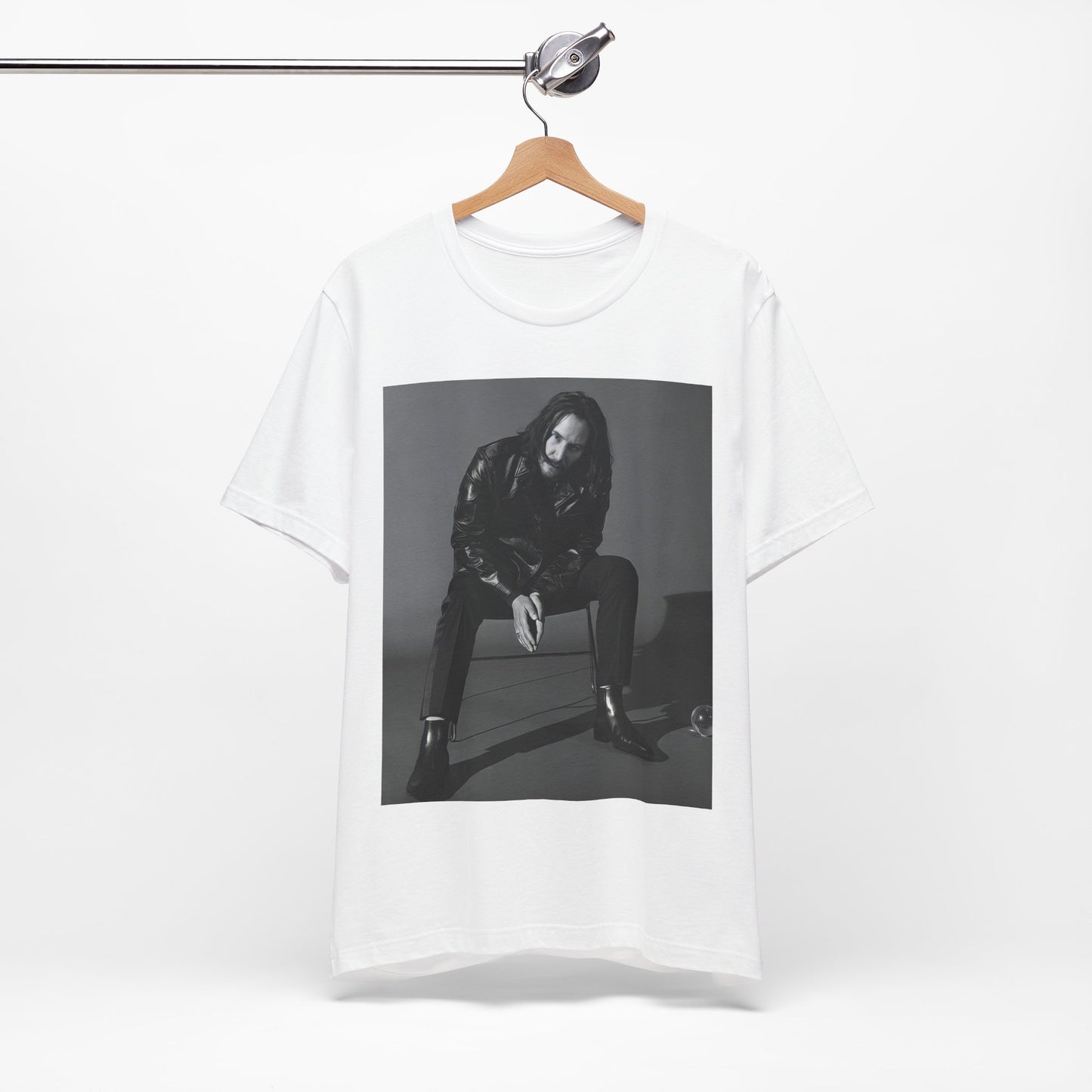 A black graphic t-shirt featuring a graphic of Keanu Reeves as John Wick.