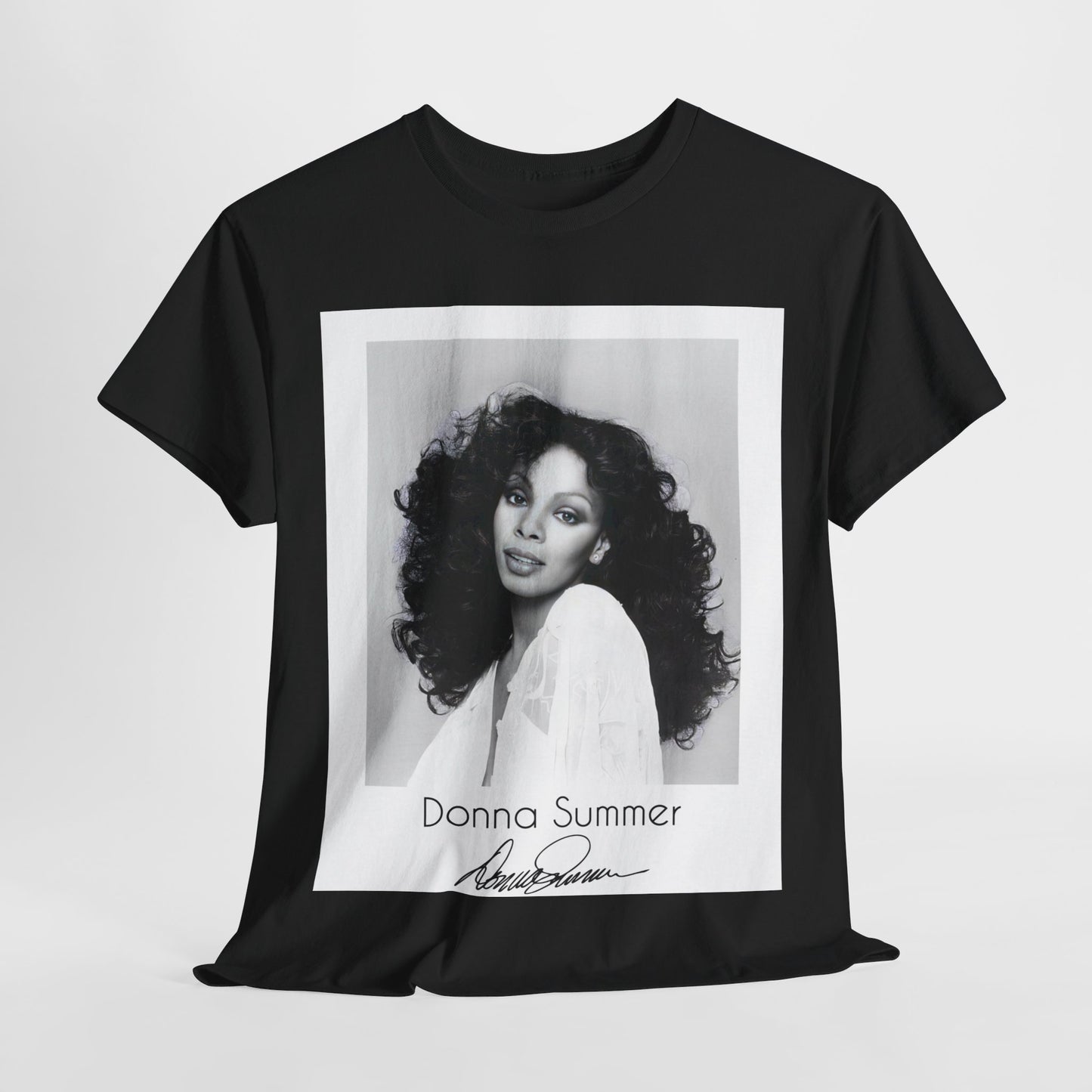 A black graphic t-shirt featuring a portrait of Donna Summer, possibly with her signature or iconic elements.