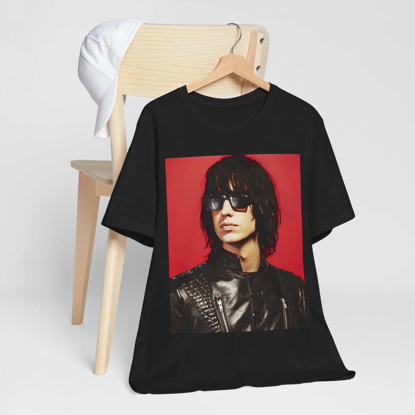 A black graphic t-shirt featuring a 2000s indie aesthetic graphic of Julian Casablancas from The Strokes.