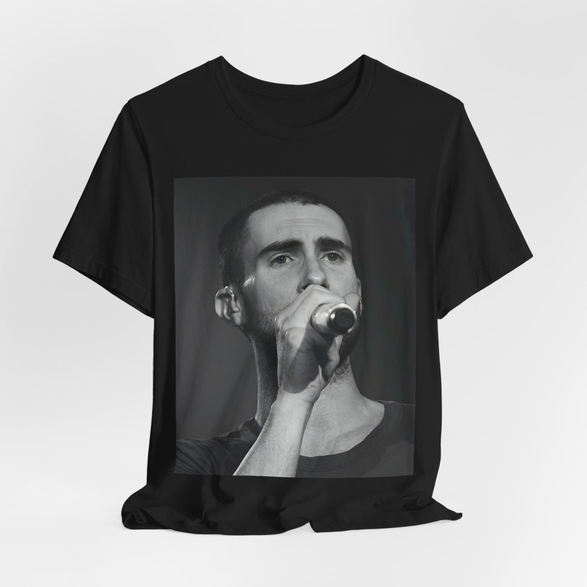 A rare, vintage black and white photo of a very young Maroon 5, from their early garage band days, printed on a t-shirt.