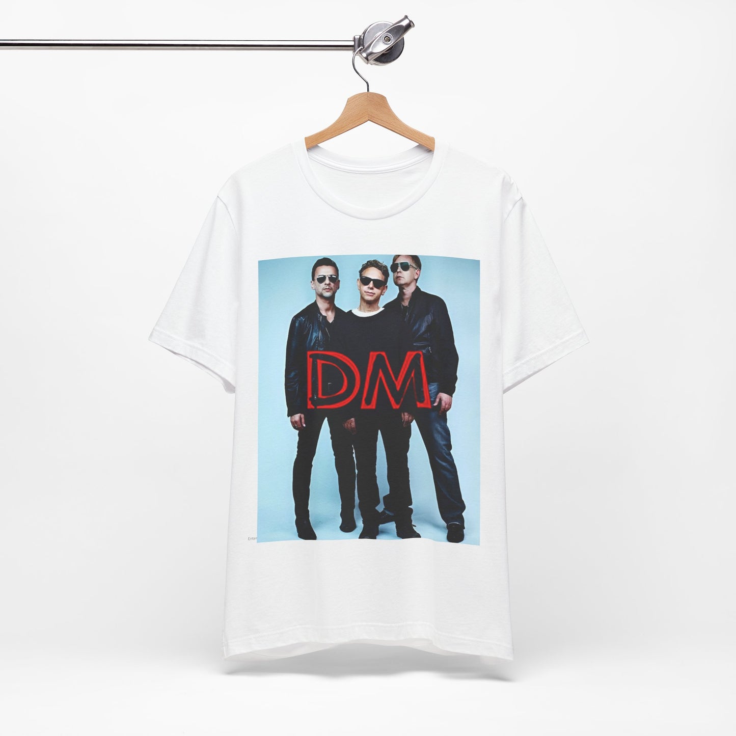 A black graphic t-shirt featuring a retro electropop graphic of Depeche Mode.