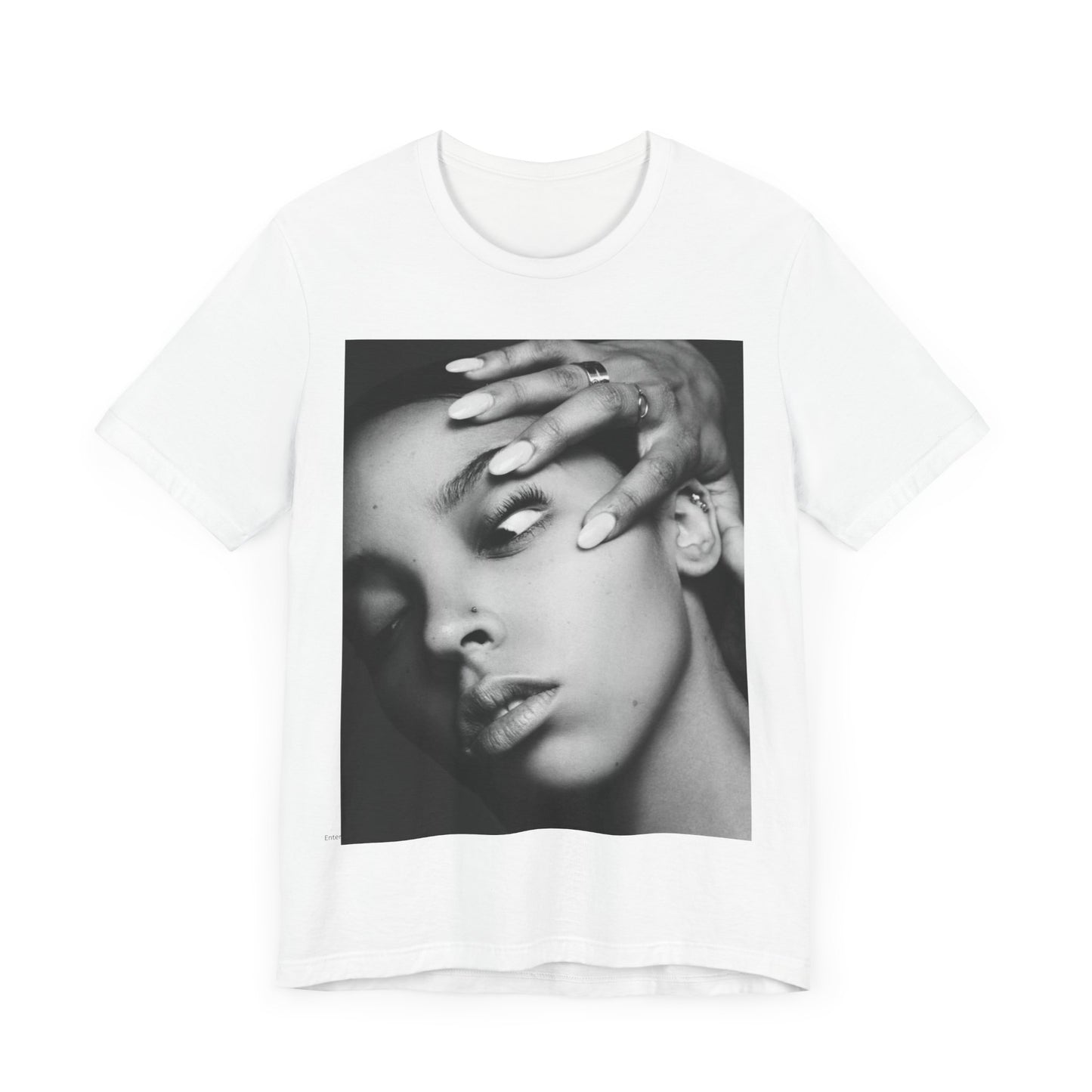 A black graphic t-shirt featuring a black and white, monochrome graphic or photo of Tinashe.