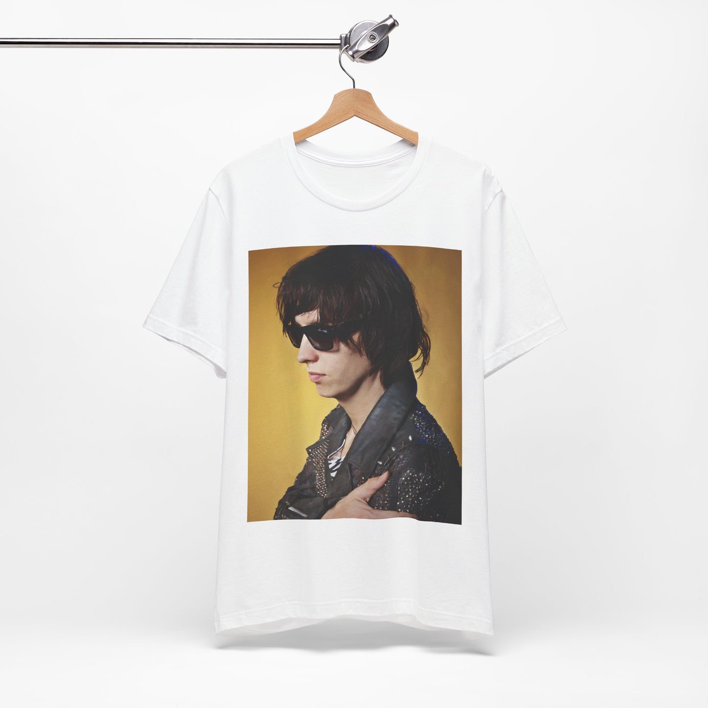 A black graphic t-shirt featuring a retro graphic related to The Strokes' 'Is This It' album era.