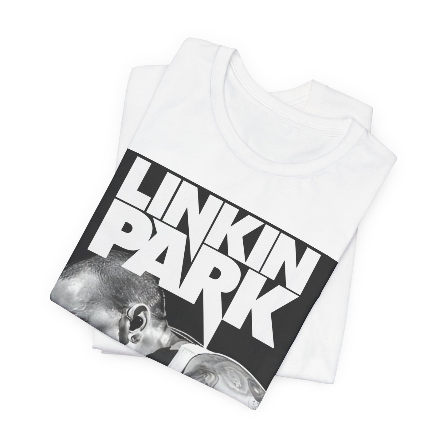 A black graphic t-shirt featuring a black and white graphic or photo portrait of Chester Bennington from Linkin Park.