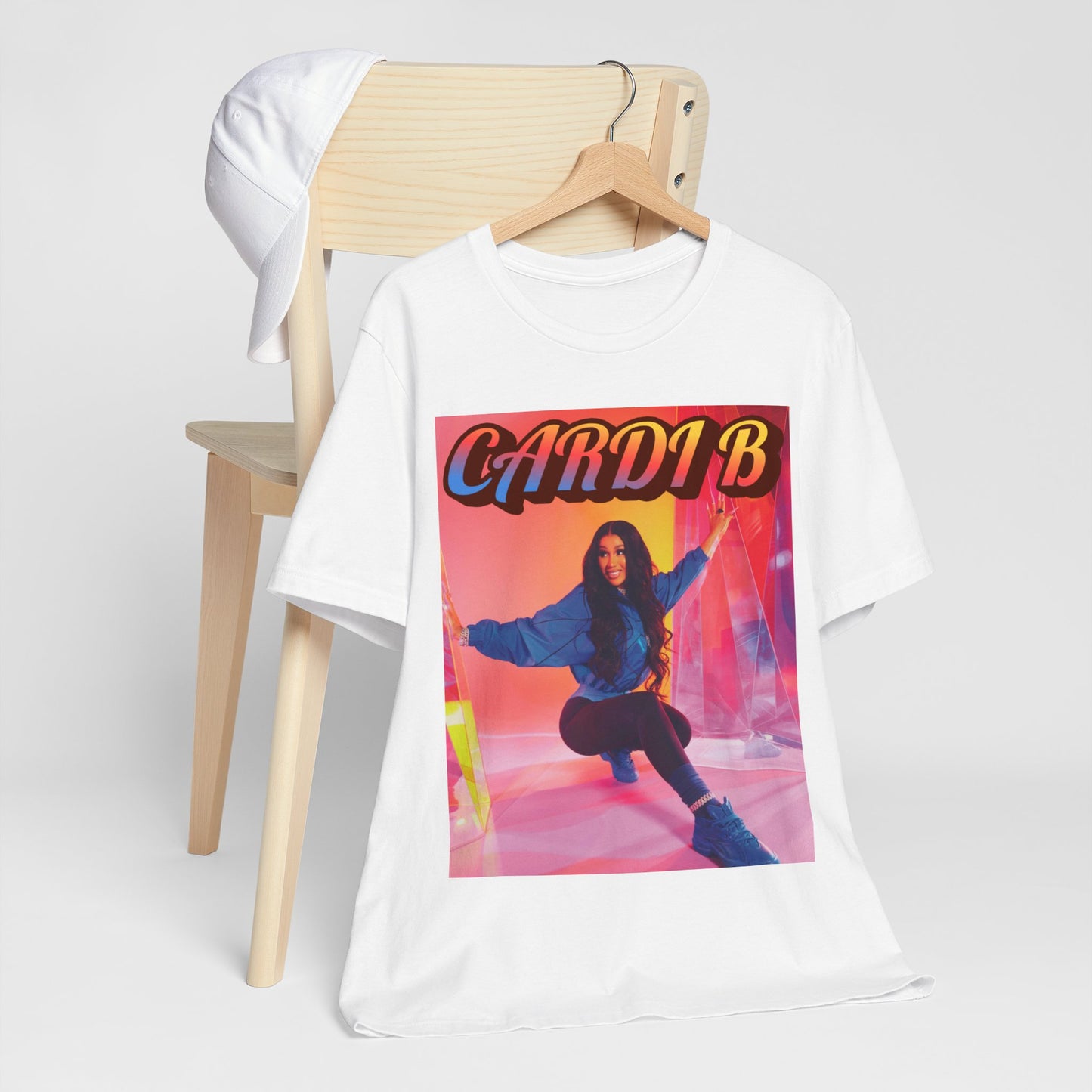 A black graphic t-shirt featuring a graphic of Cardi B, designed with a rap aesthetic.
