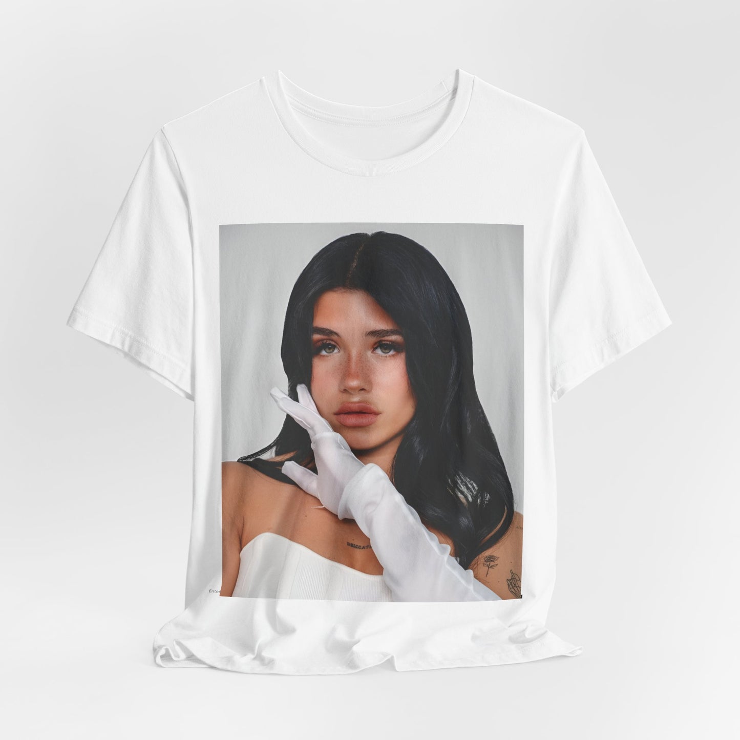 A black graphic t-shirt featuring a portrait graphic of Nessa Barrett.