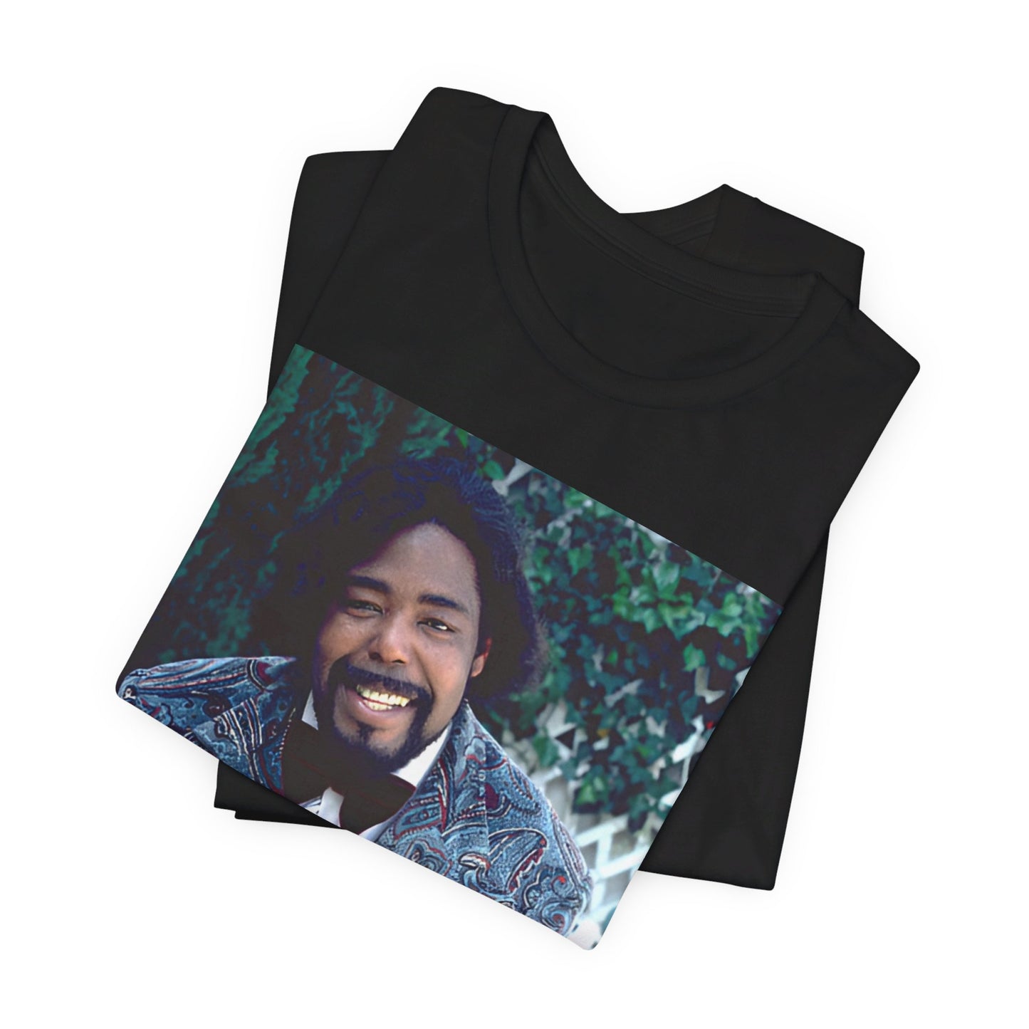 A black graphic t-shirt featuring a retro 70s photo of Barry White, evoking the disco era.