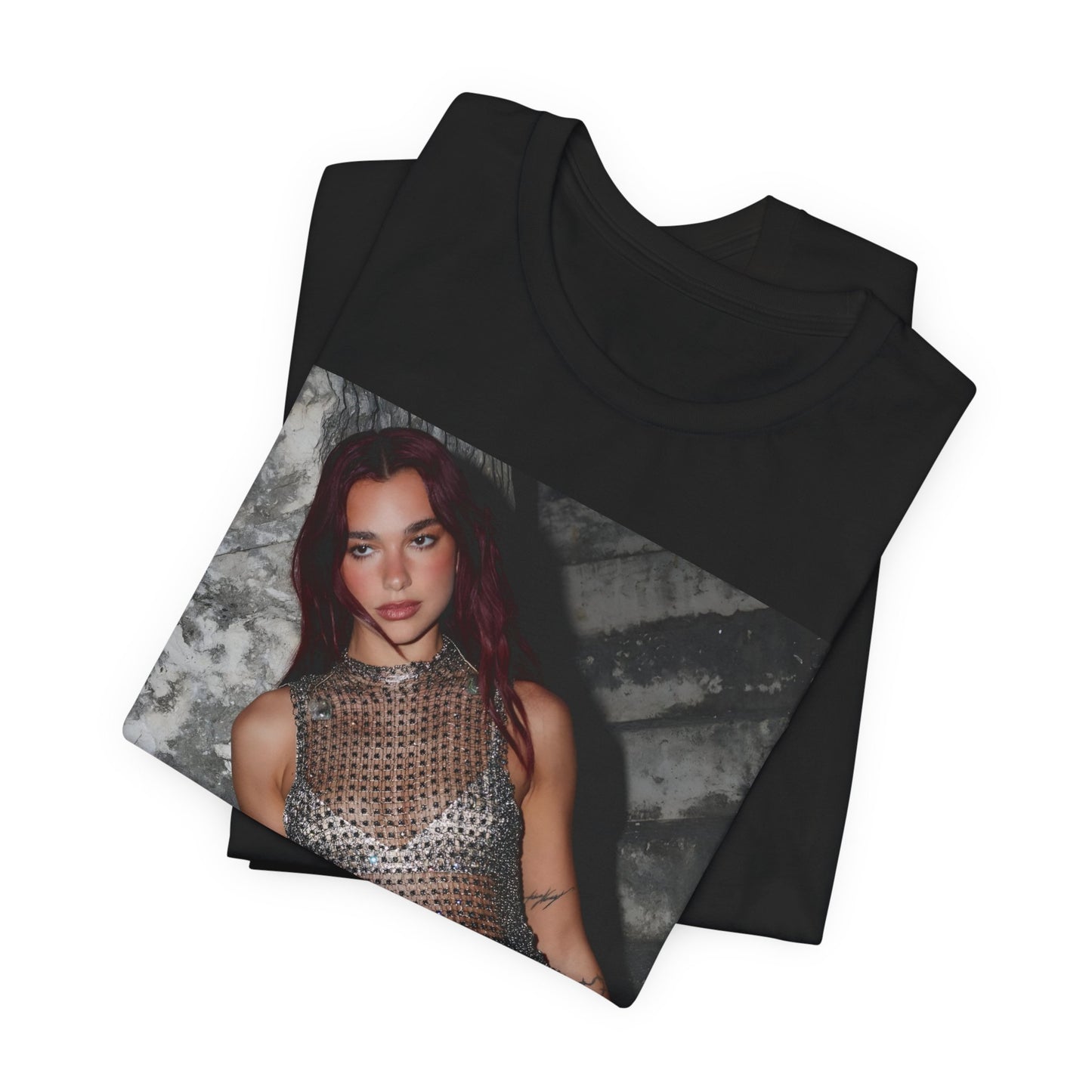 A black graphic t-shirt featuring a graphic of Dua Lipa as a disco queen, with an aesthetic design.