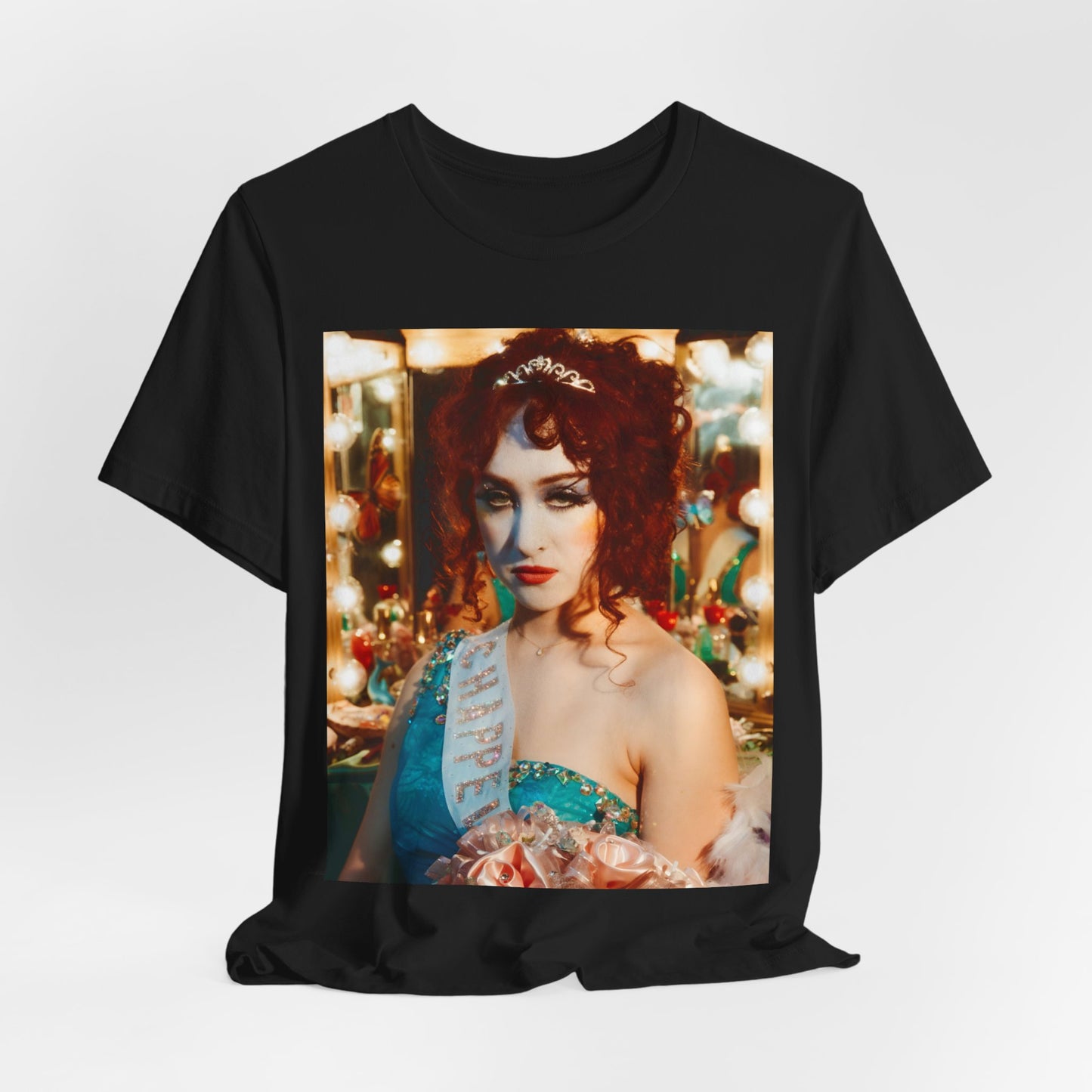 A black graphic t-shirt featuring a graphic of Chappell Roan in a bold stage costume.