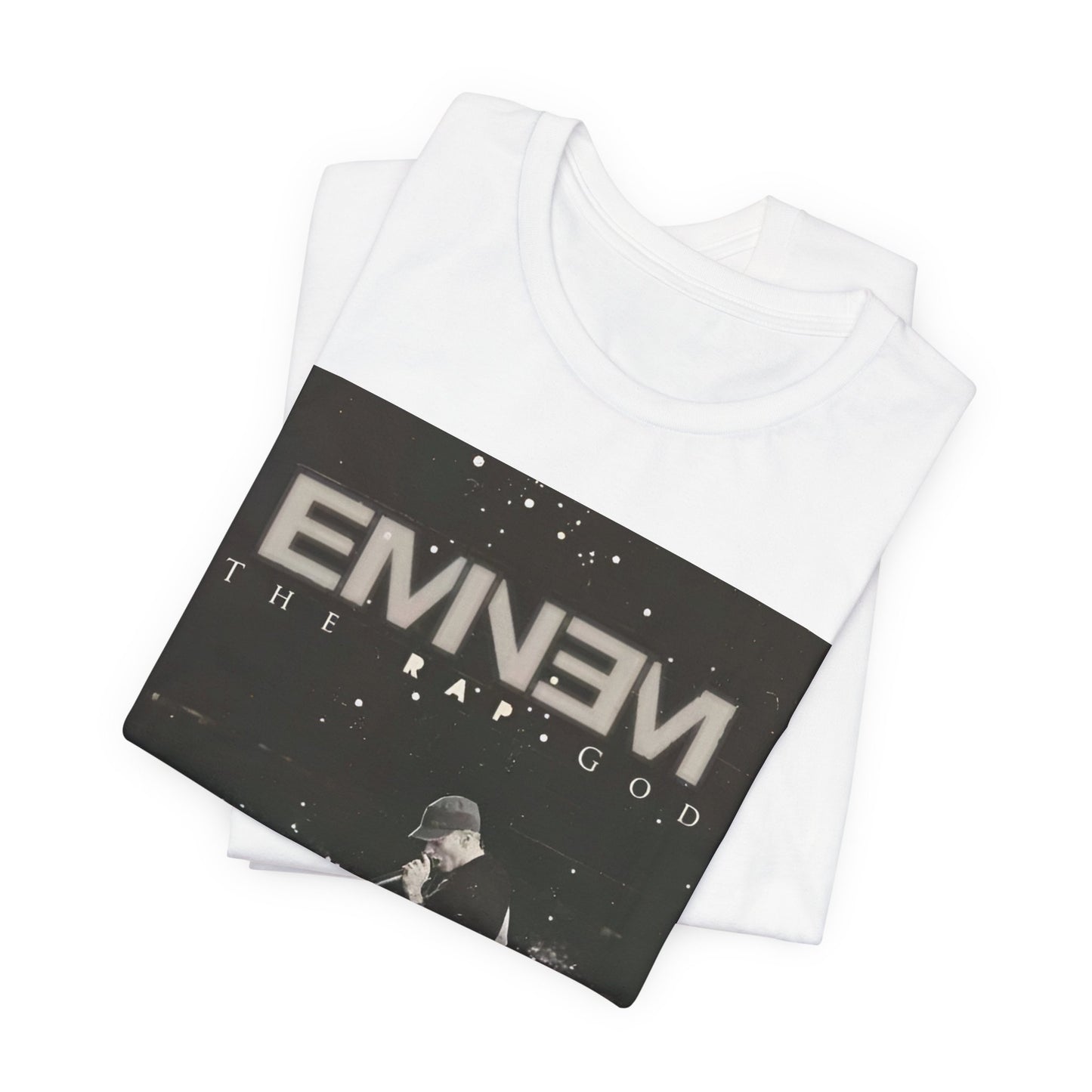 A black graphic t-shirt featuring a graphic or photo of Eminem performing live on tour.