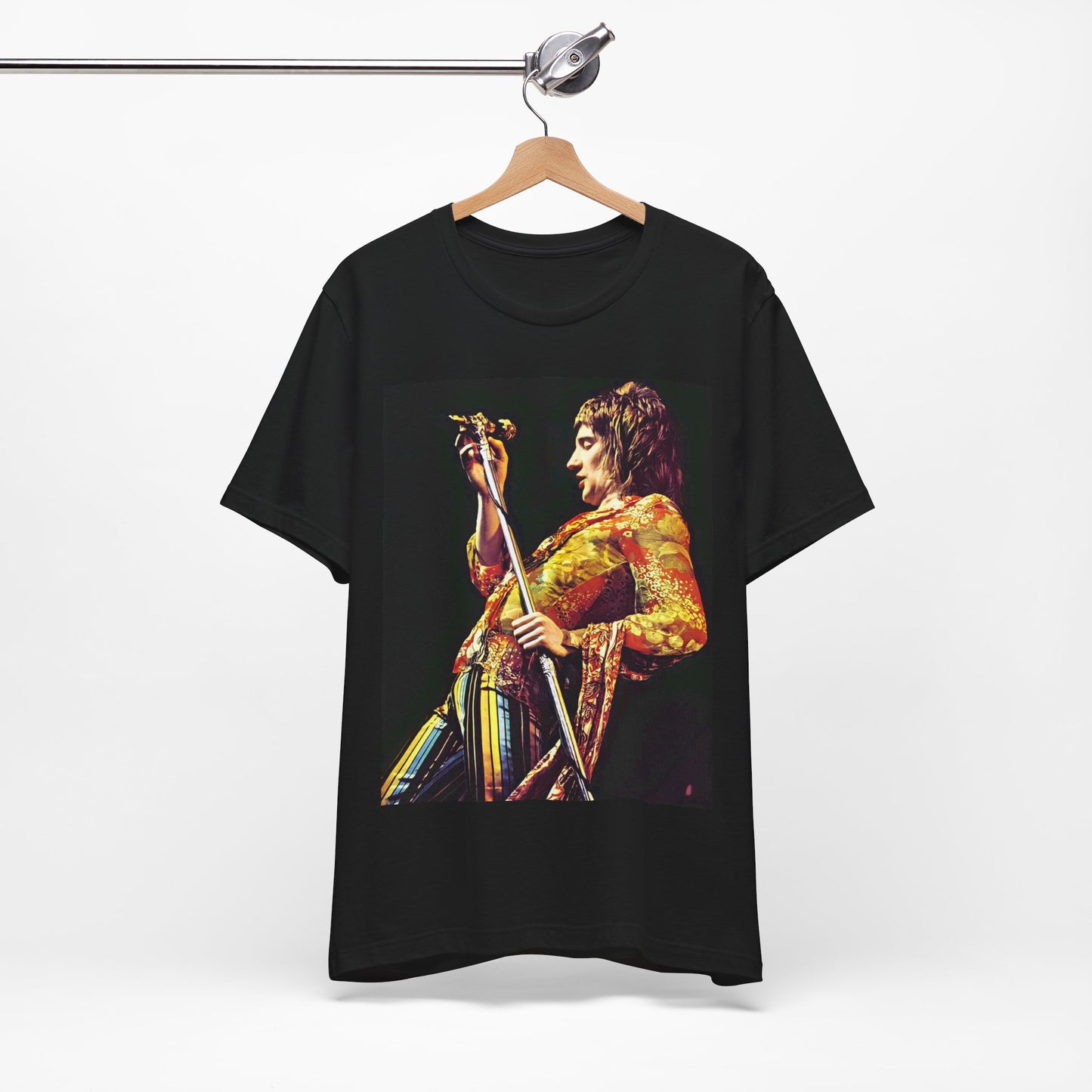 A black graphic t-shirt featuring a retro 70s graphic or photo of Rod Stewart performing live on stage.