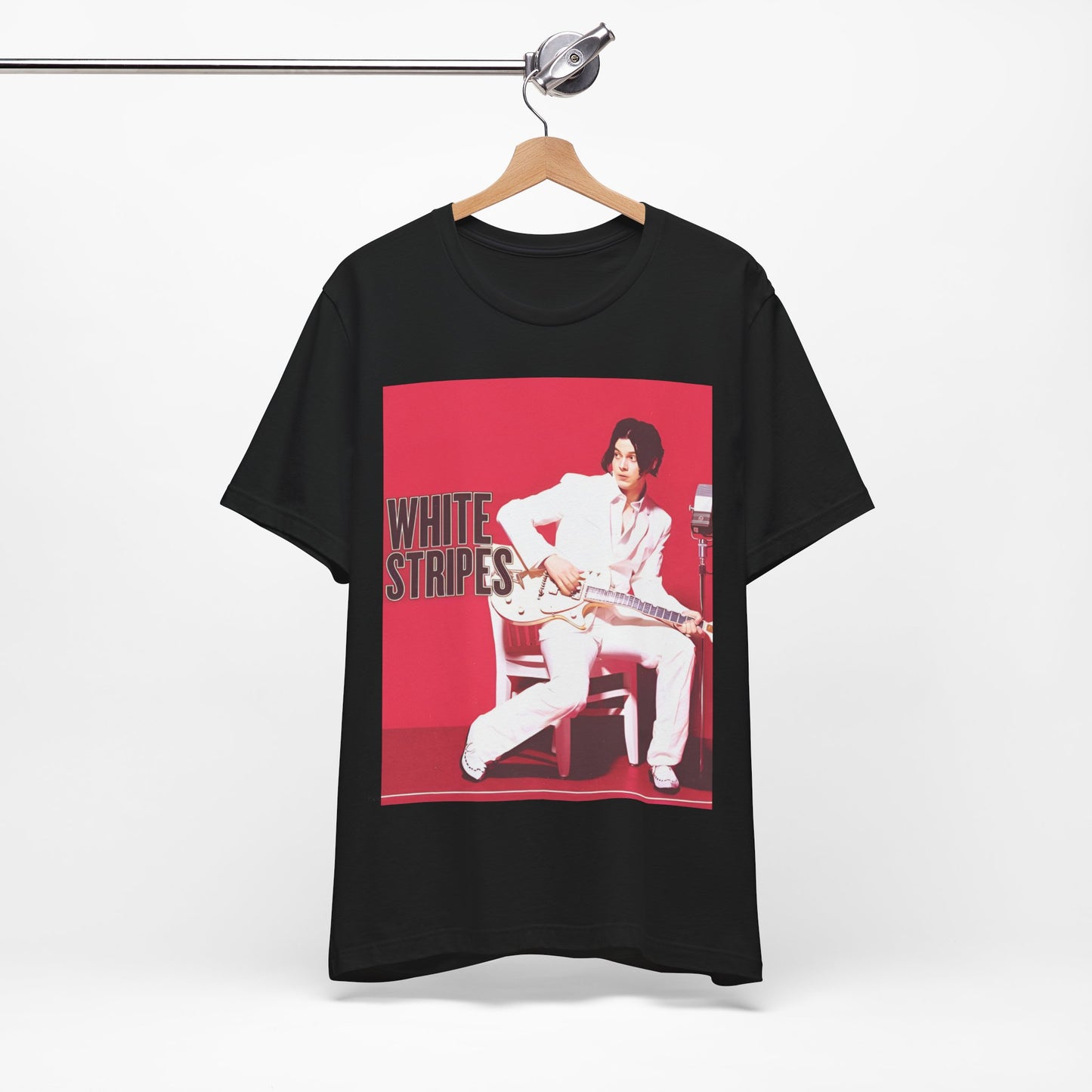 A black graphic t-shirt featuring a graphic related to The White Stripes' 'Fell In Love With A Girl' song or era.