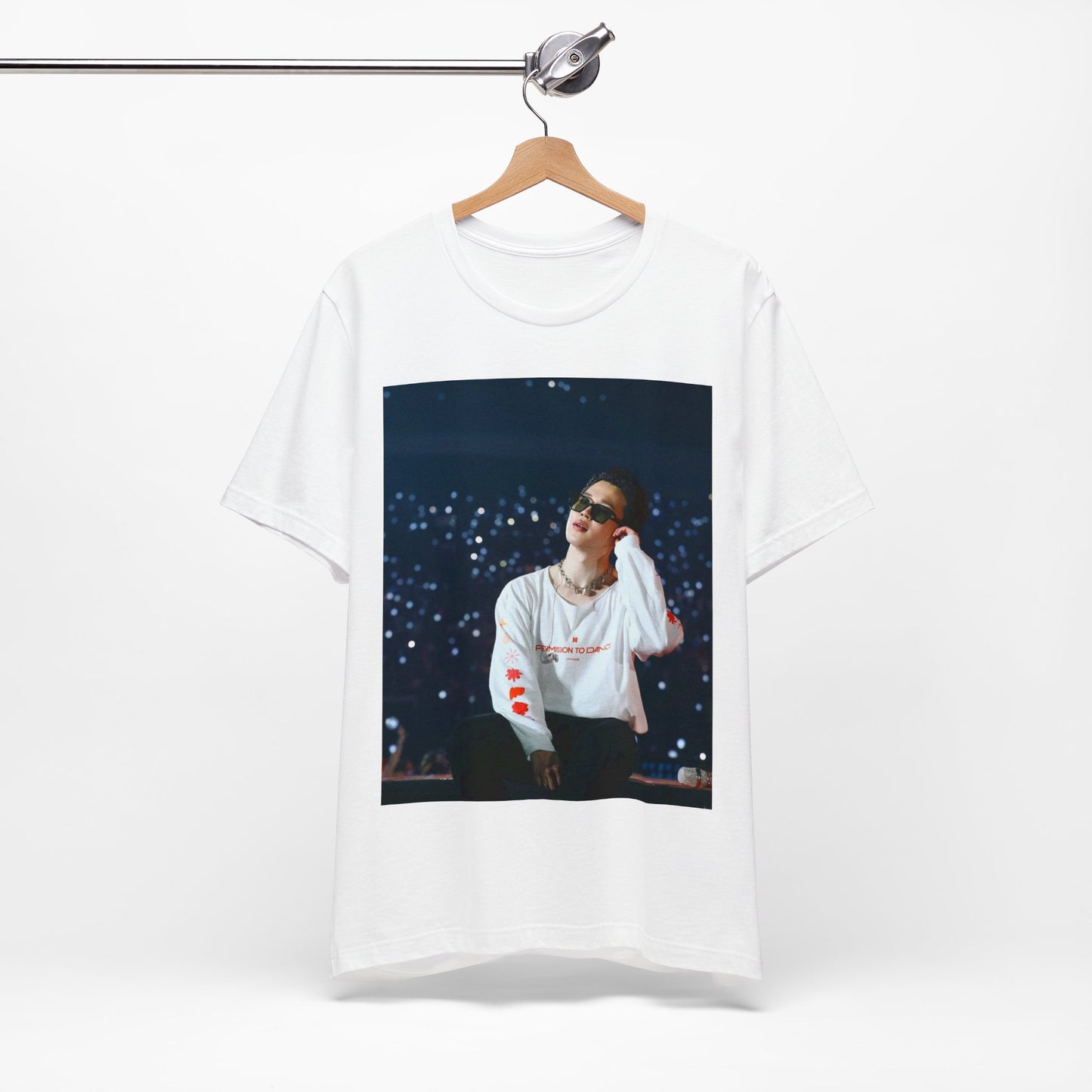 A black graphic t-shirt featuring a vintage aesthetic graphic related to Jimin's 'Lie' era.