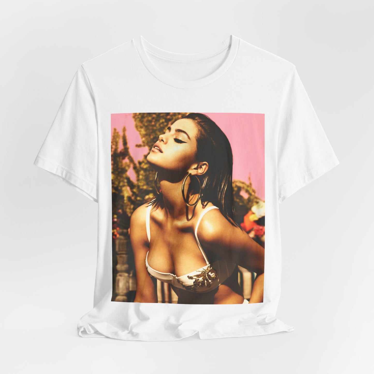 A black graphic t-shirt featuring a graphic of Selena Gomez emphasizing her timeless beauty.