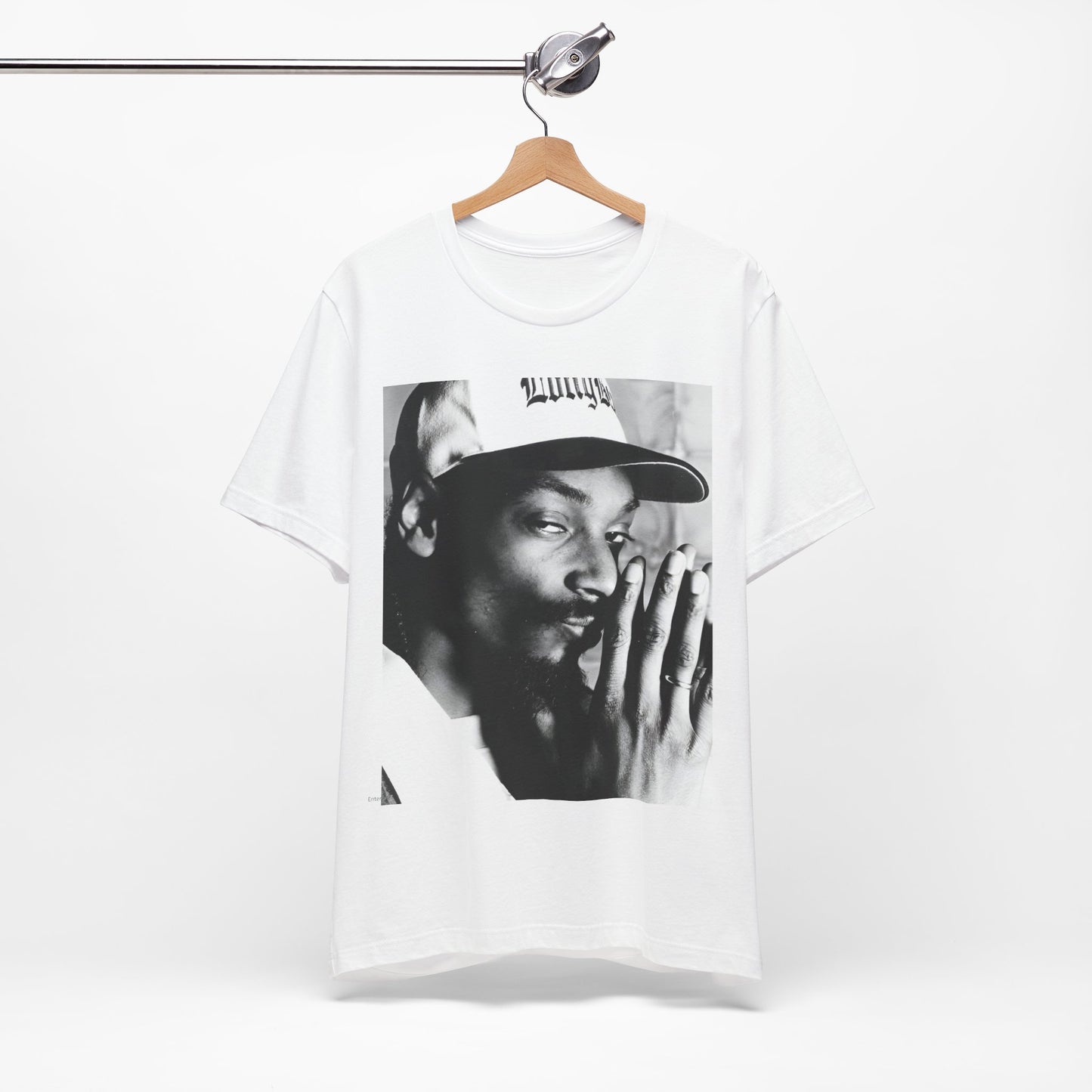 A black graphic t-shirt featuring a cool black and white graphic or photo of Snoop Dogg as a rapper.