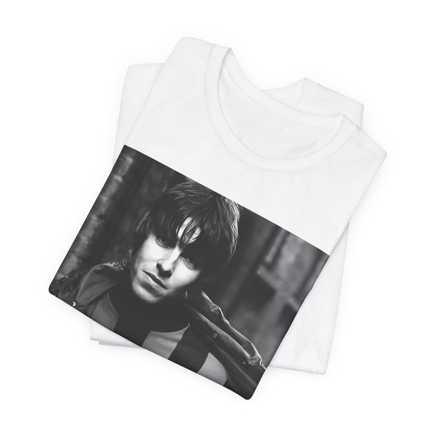 A black graphic t-shirt featuring a photo of Liam Gallagher from Oasis, showing his support for Manchester City.
