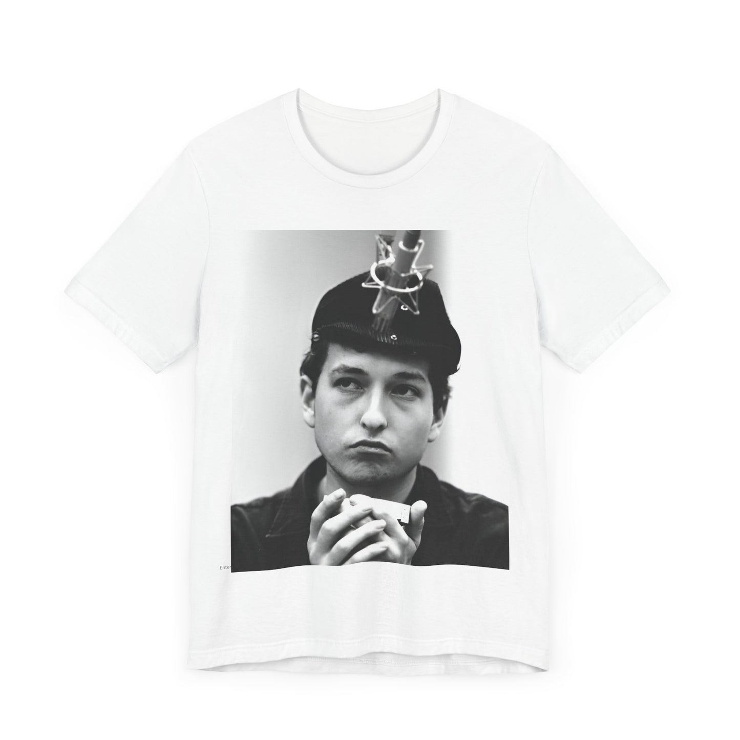 A black graphic t-shirt featuring a graphic of Bob Dylan in an acoustic session setting, possibly with his guitar.