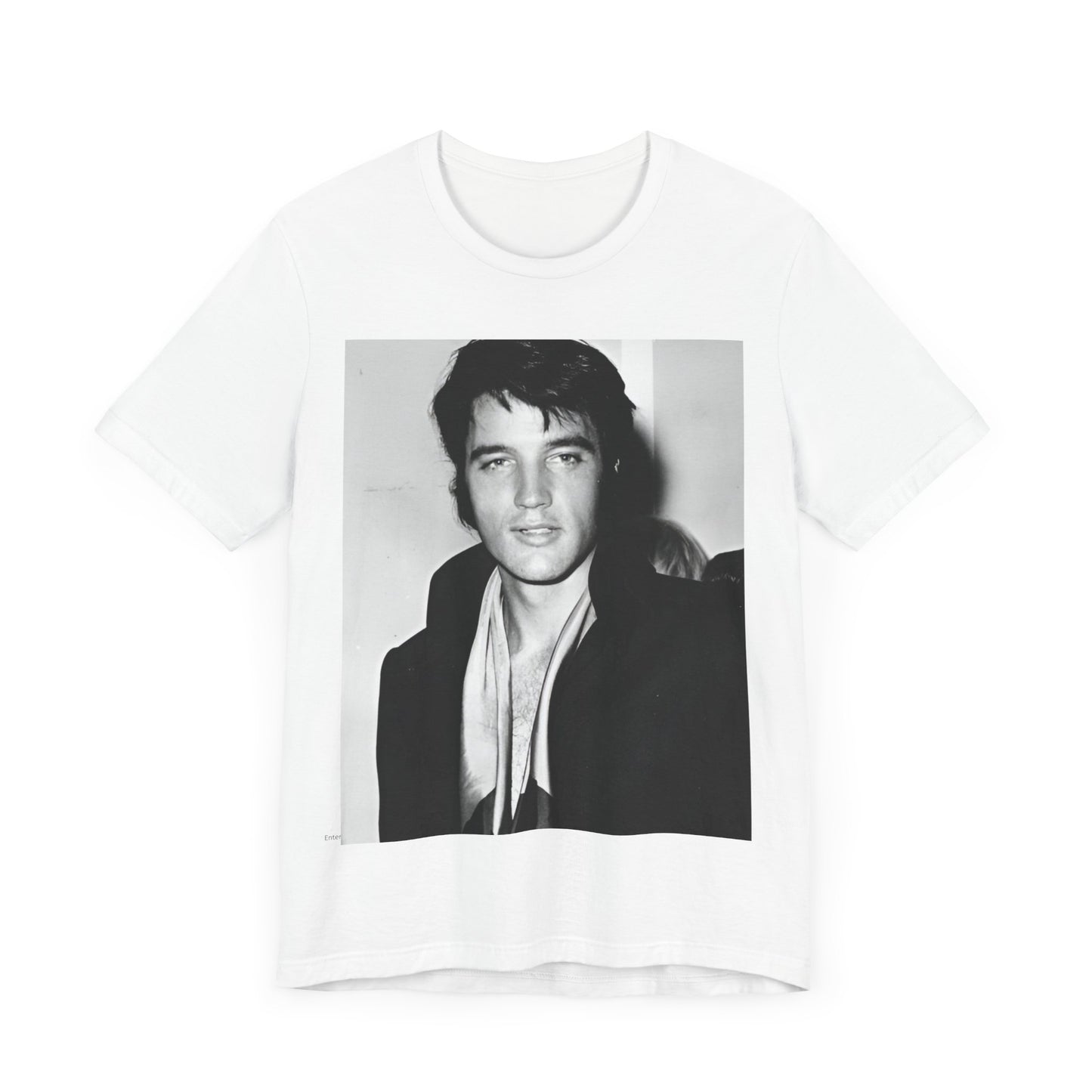 A black graphic t-shirt featuring a black and white rock and roll portrait photo of Elvis Presley.