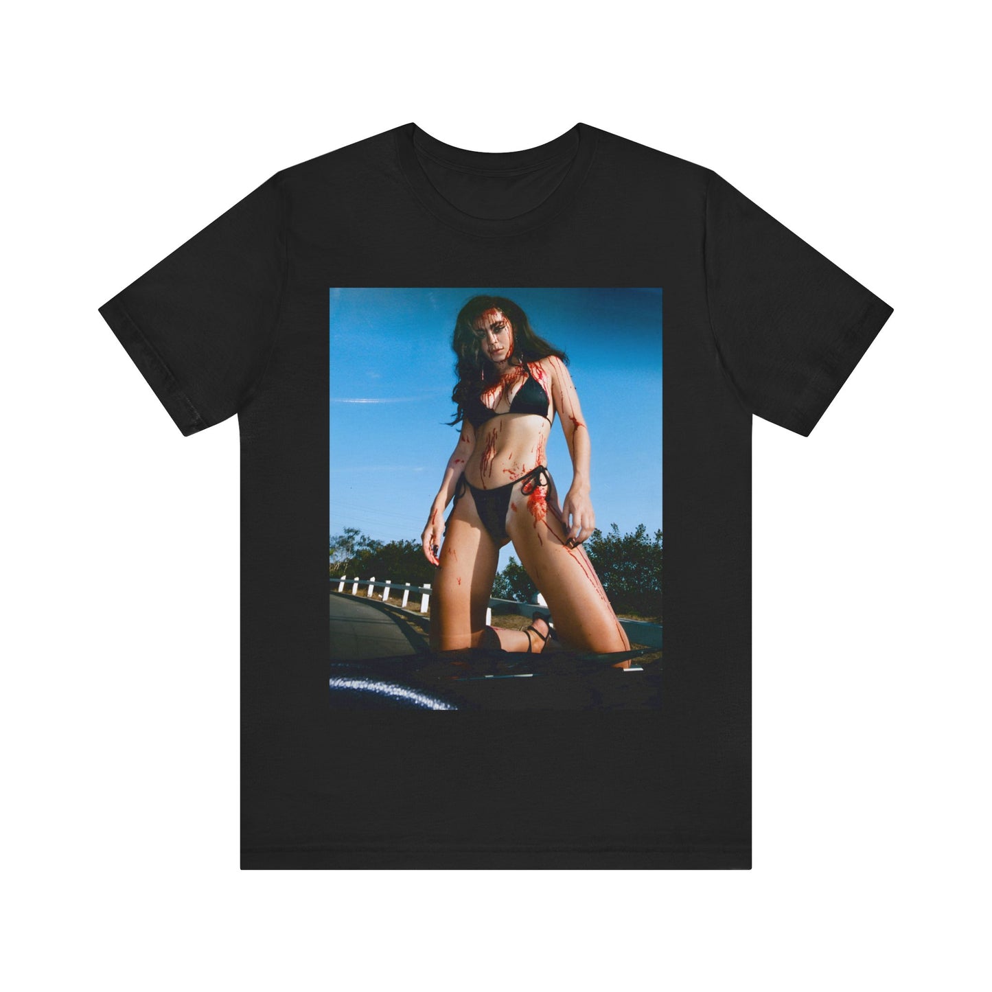 A black graphic t-shirt featuring the album cover art for Charli XCX's 'CRASH' album.