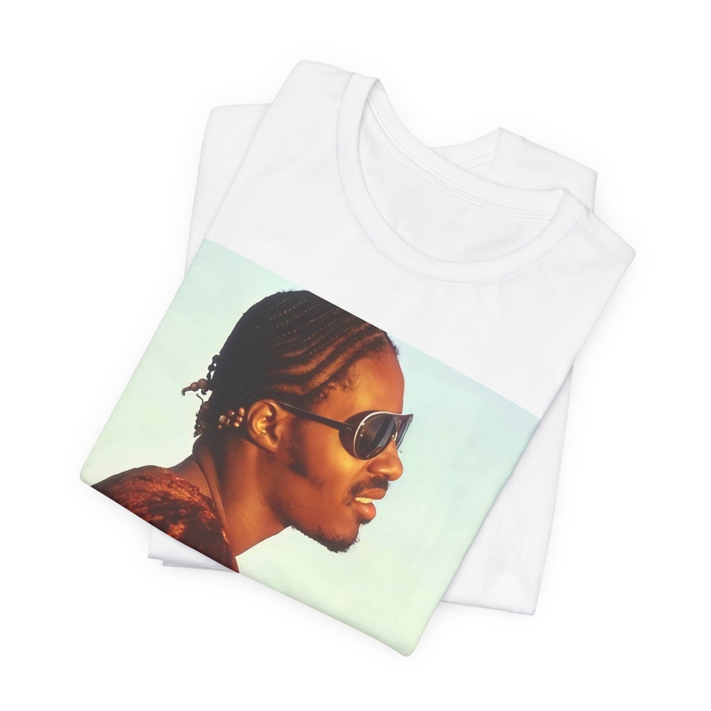 A black graphic t-shirt featuring a graphic of Stevie Wonder as an iconic style pop innovator.