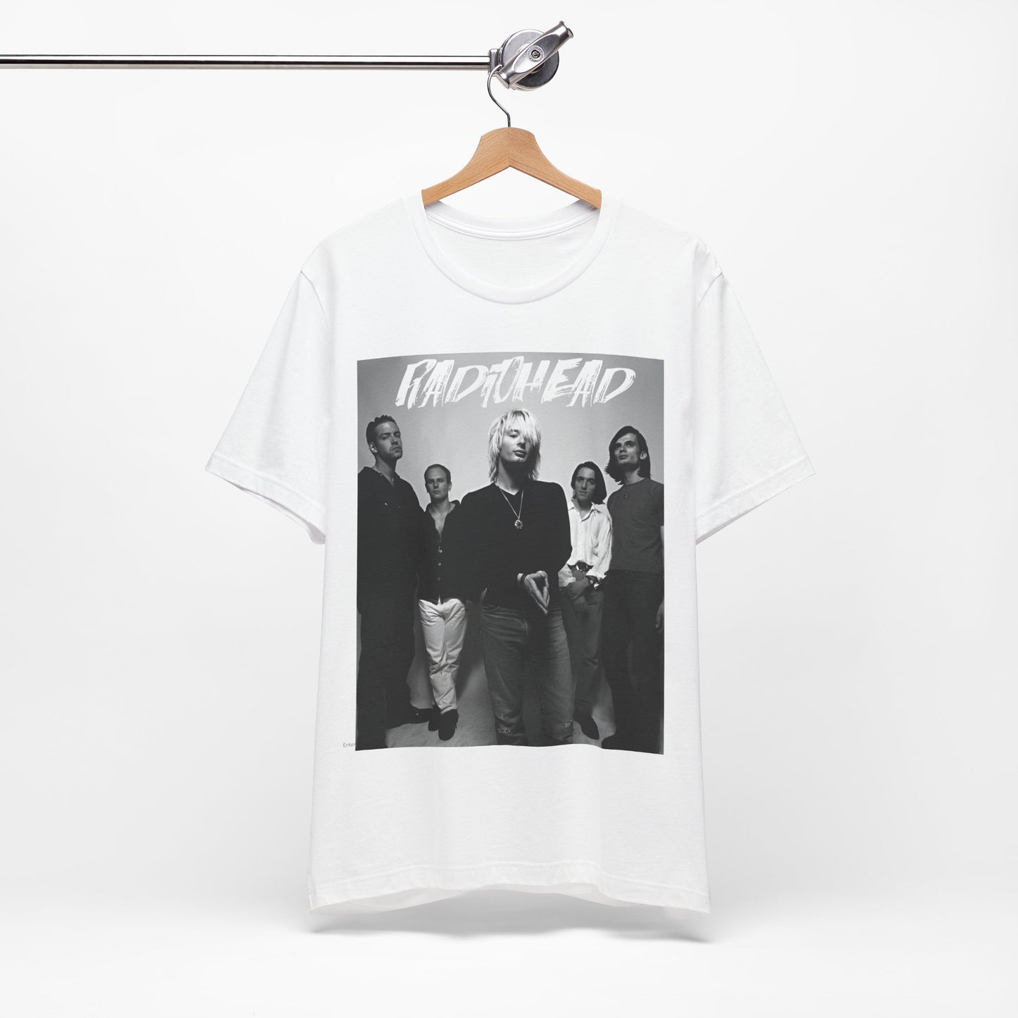 A black graphic t-shirt featuring a retro graphic related to Radiohead's 'OK Computer' album era.