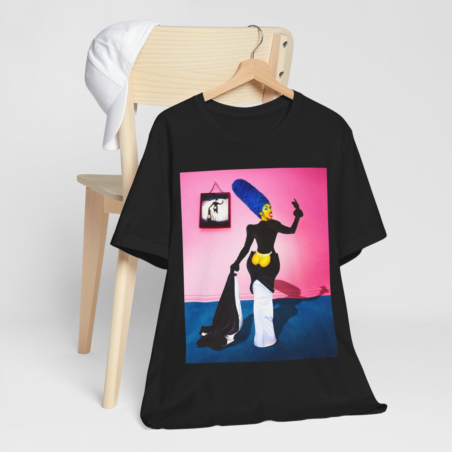 A black graphic t-shirt featuring a photo or graphic of Cardi B blended with elements or characters from The Simpsons.