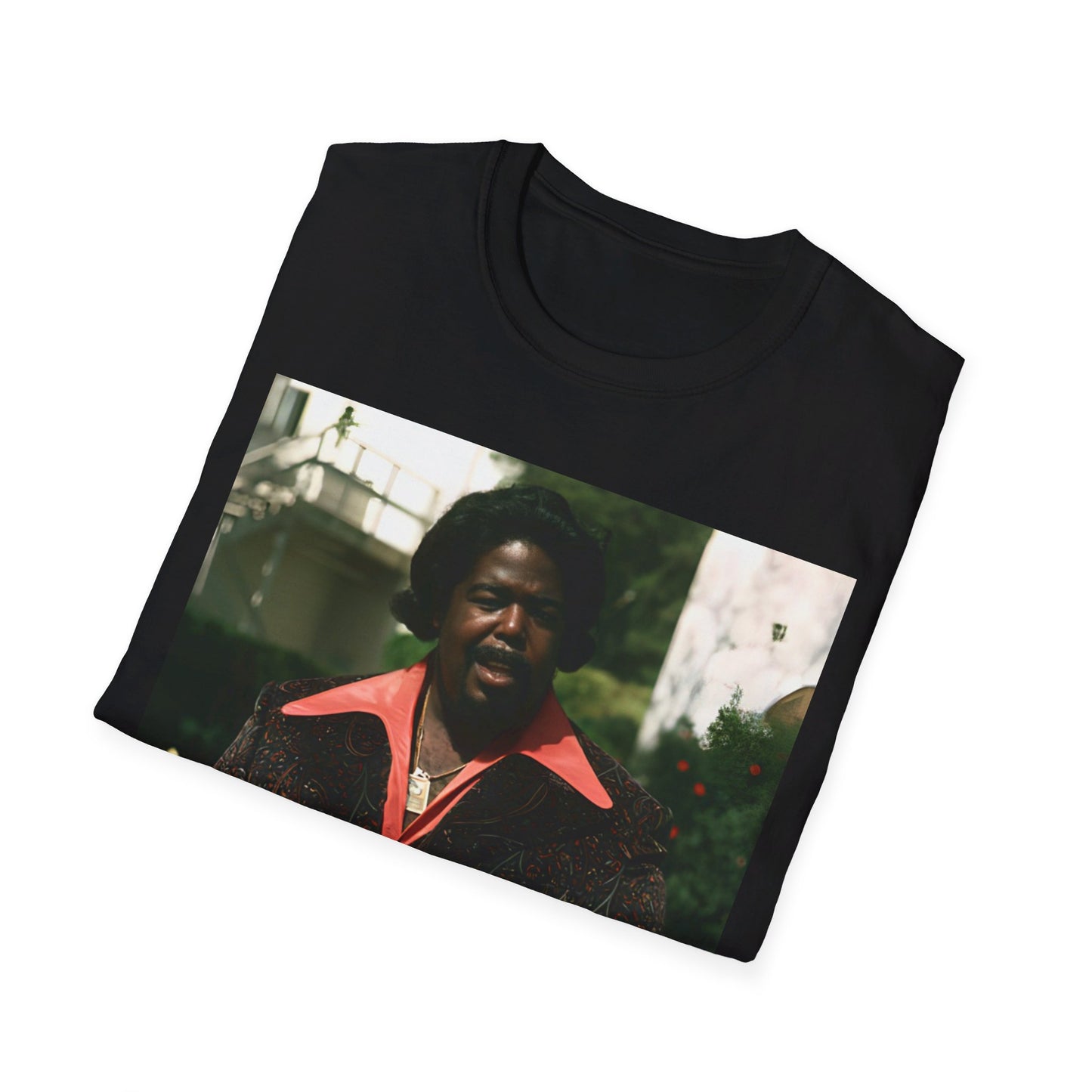 A black graphic t-shirt featuring a graphic of Barry White, emphasizing his romantic and soulful presence from the 1970s.