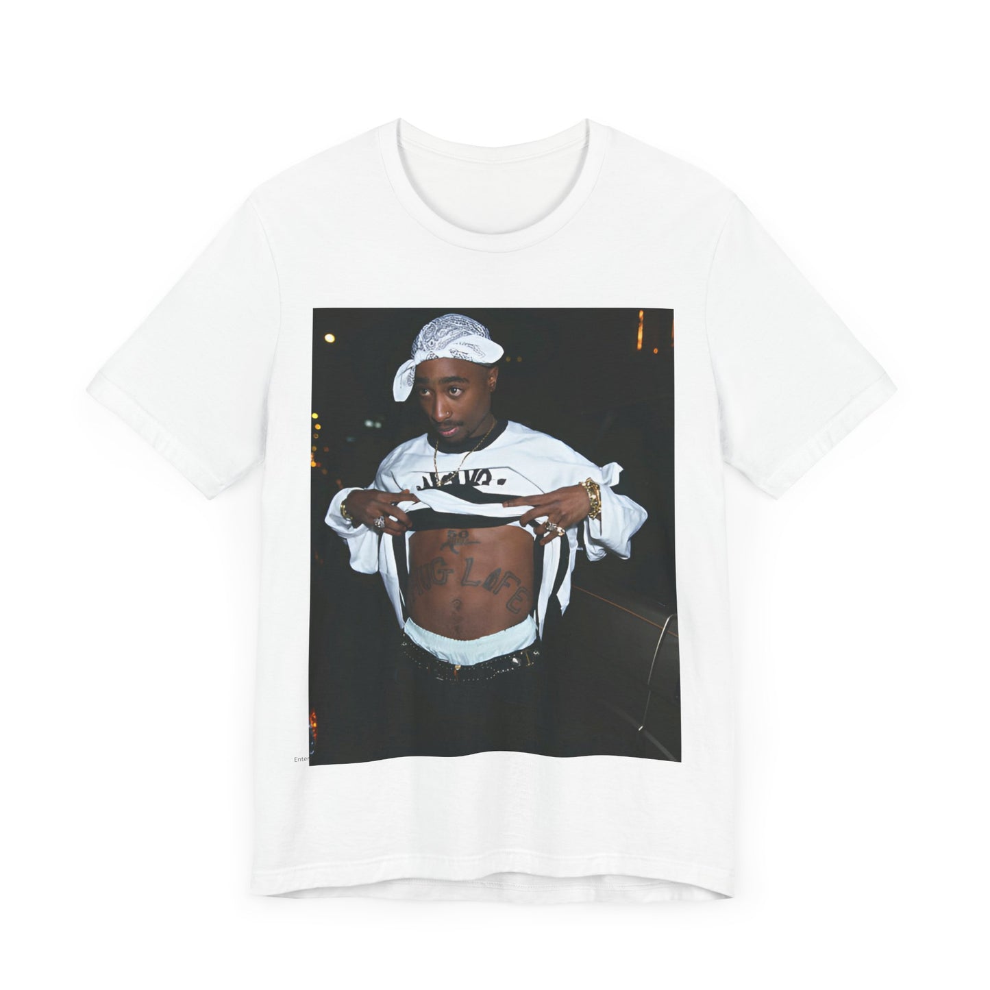 A black graphic t-shirt featuring a graphic of Tupac Shakur (2Pac).