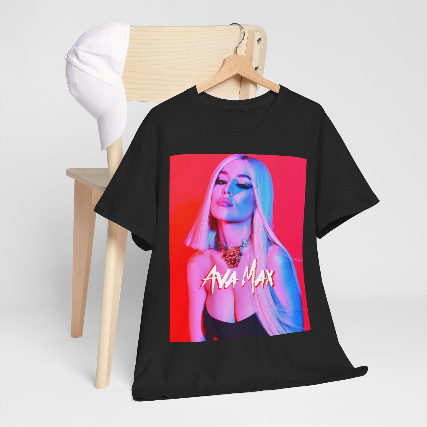 A black graphic t-shirt featuring a colorful pop art style graphic of Ava Max, with bright hues and bold lines.