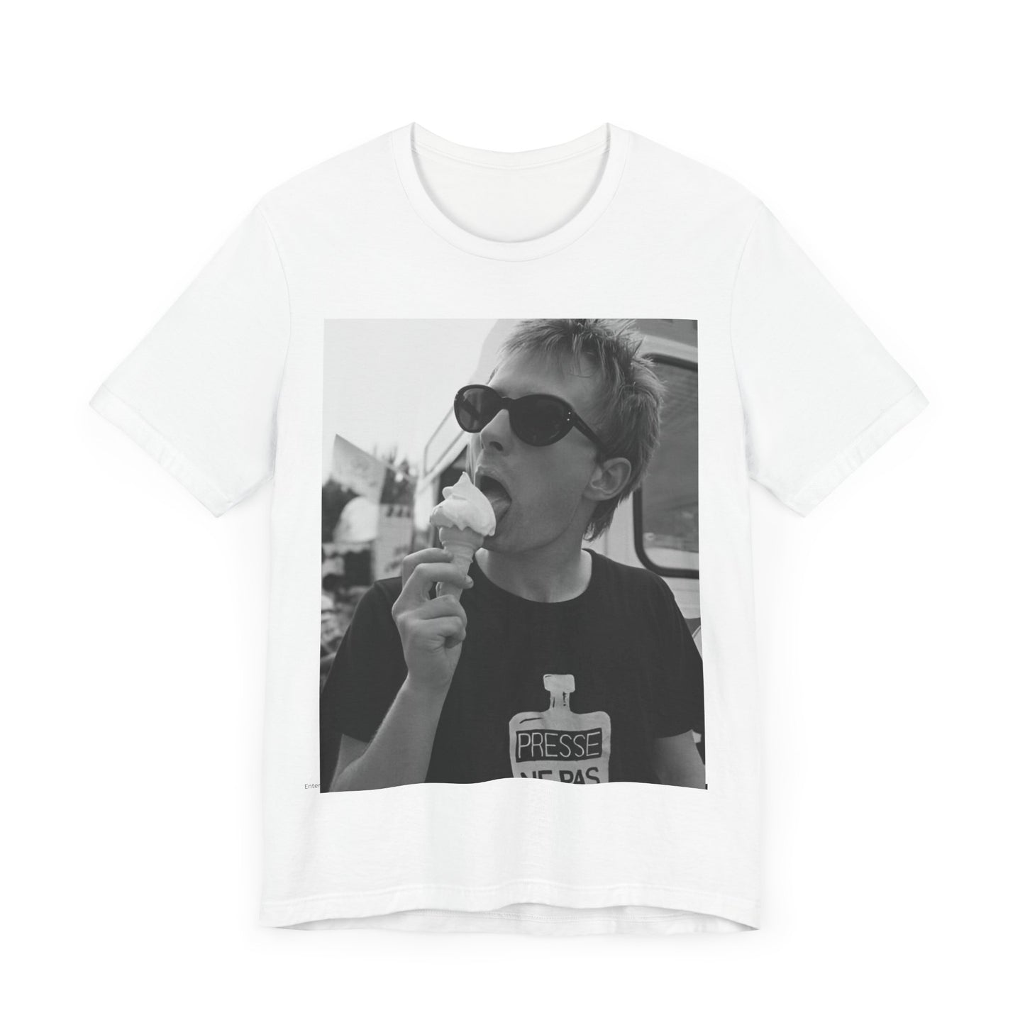A black graphic t-shirt featuring a graphic of Thom Yorke from Radiohead with an ice cream cone.