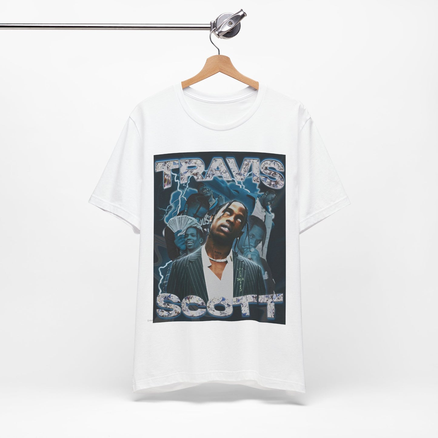 A black graphic t-shirt featuring a 90s bootleg style graphic of Travis Scott.