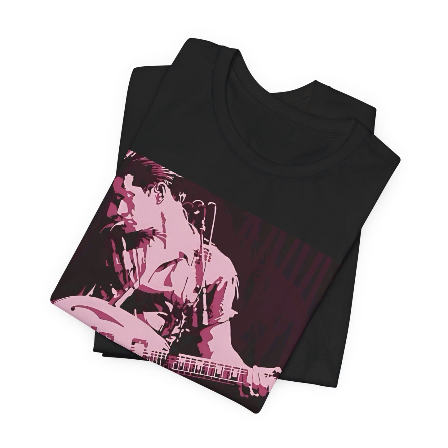 A black graphic t-shirt featuring the Arctic Monkeys logo in a prominent pink color, creating an aesthetic look.