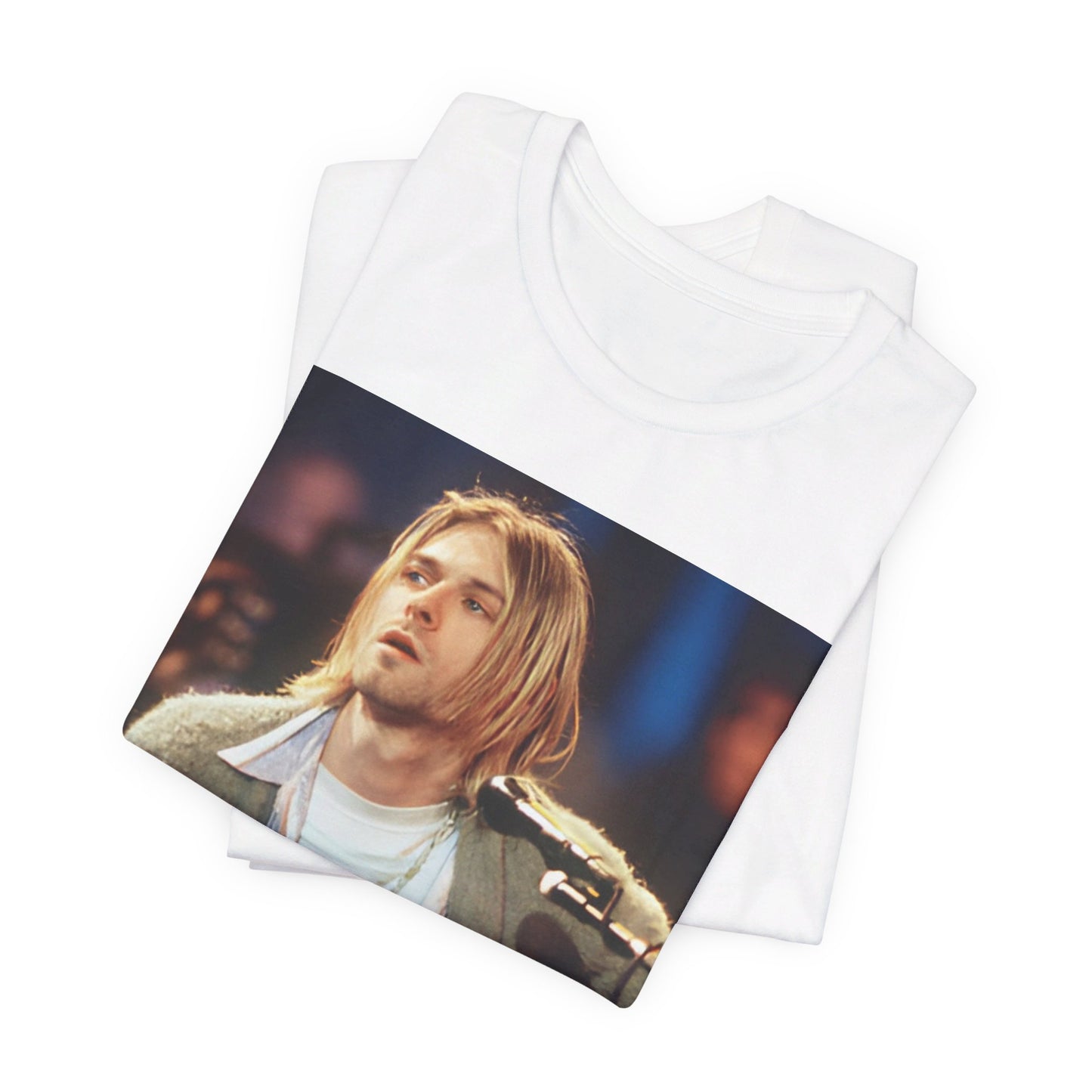 A black graphic t-shirt featuring a graphic related to Nirvana's 1994 Unplugged performance.