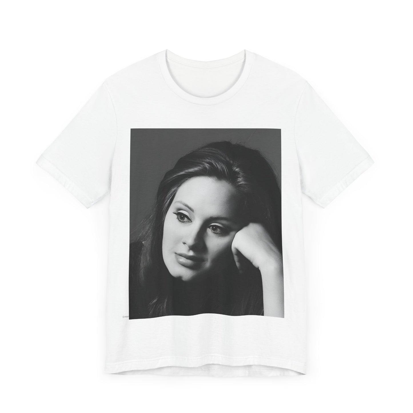 A black graphic t-shirt featuring a vintage-style black and white studio portrait of Adele, showing her with a poised and elegant expression.