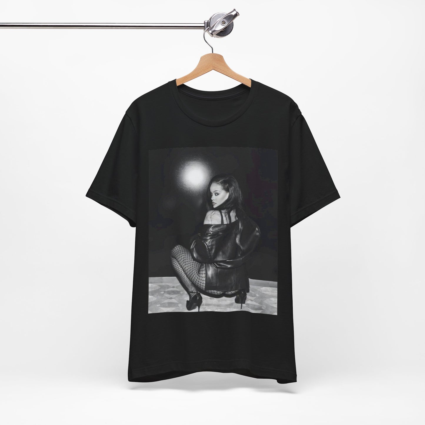 A black graphic t-shirt featuring a black and white sexy graphic of Rihanna.