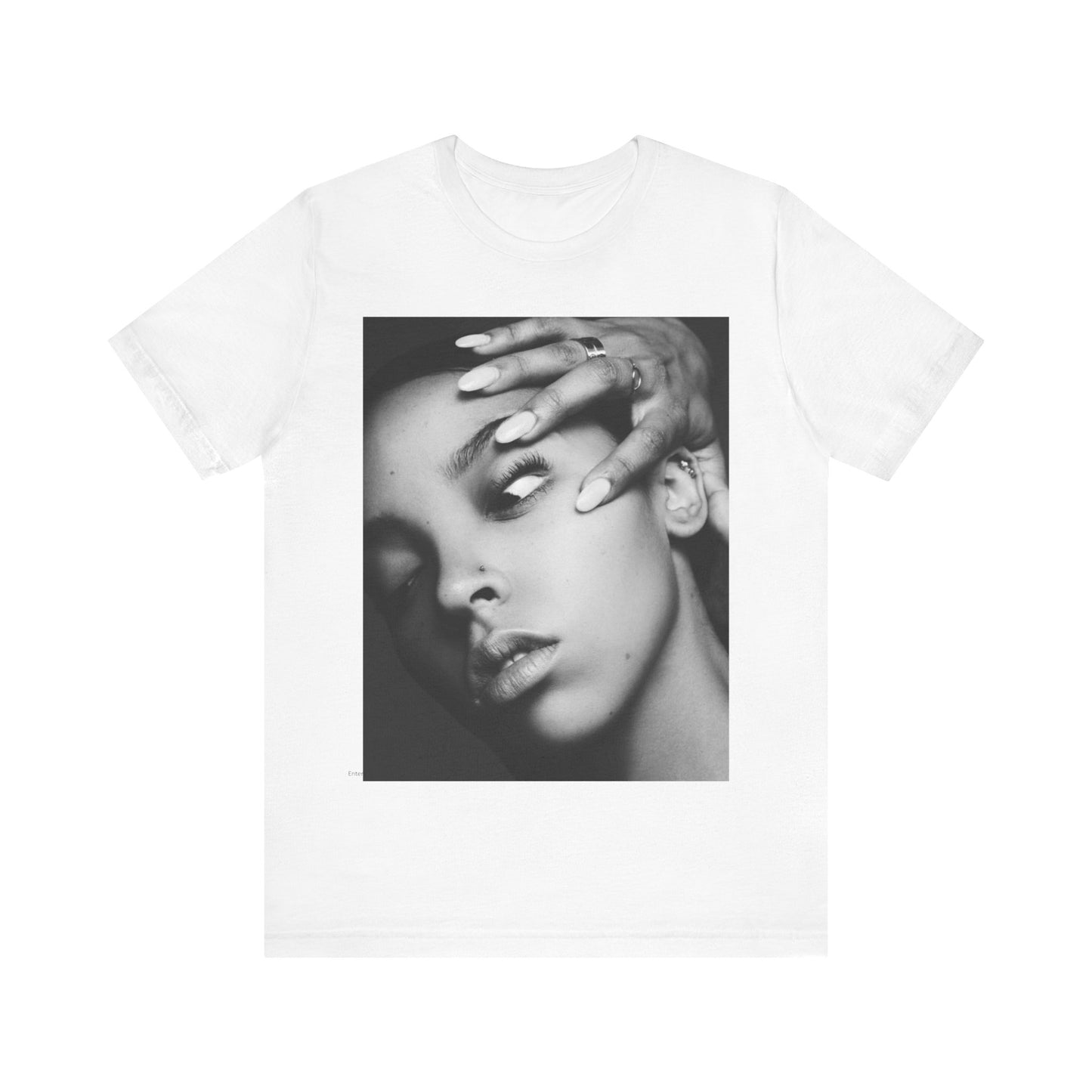 A black graphic t-shirt featuring a black and white, monochrome graphic or photo of Tinashe.