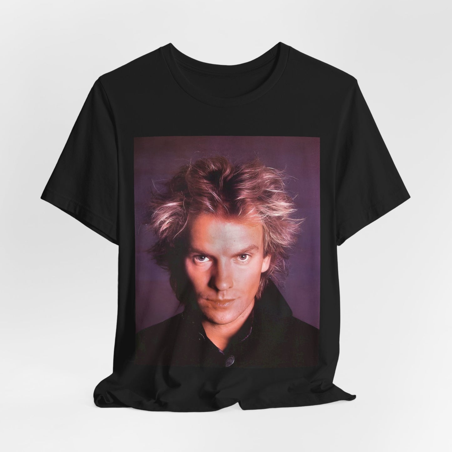 A black graphic t-shirt featuring a graphic related to Sting's 'Every Breath You Take' song or era.