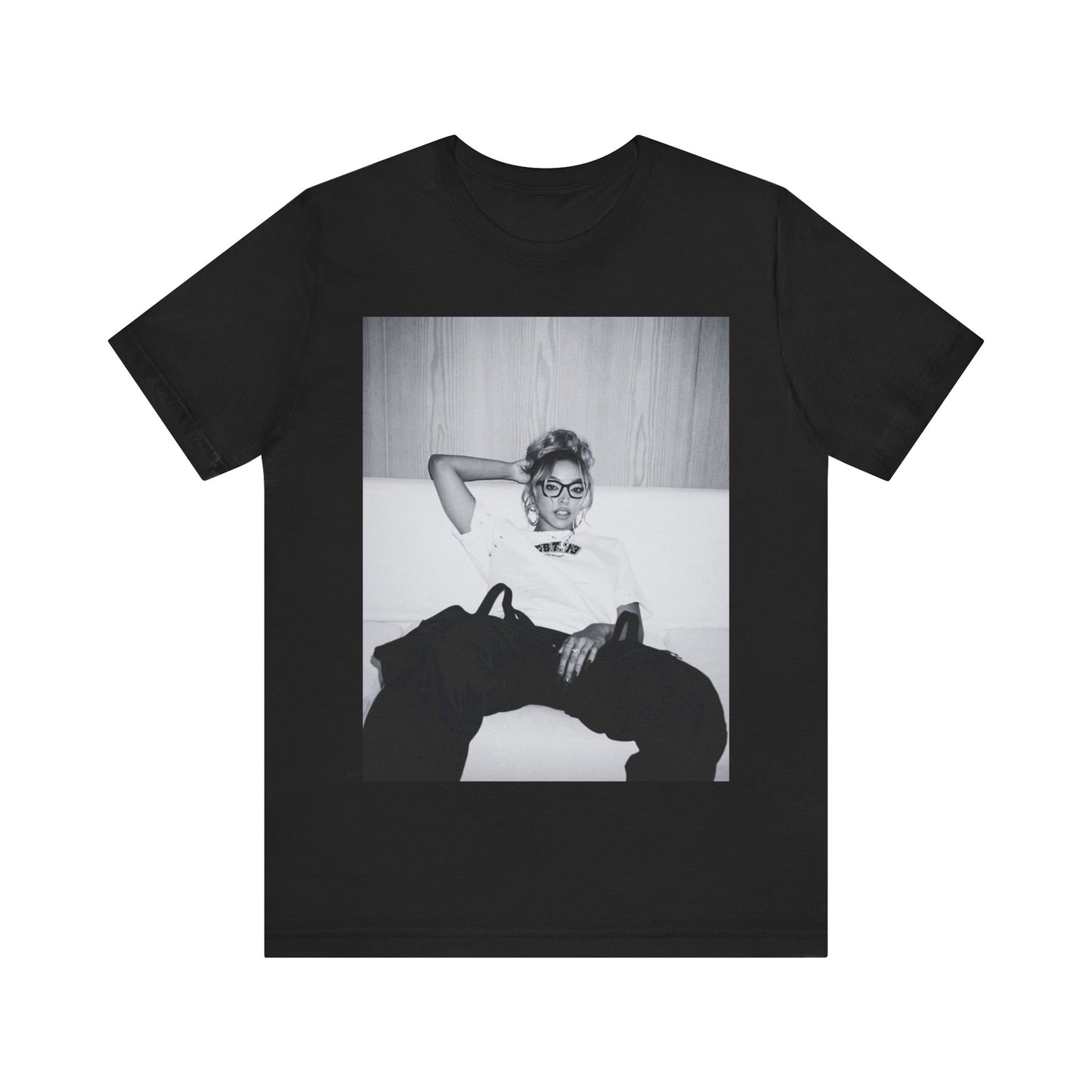 A black graphic t-shirt featuring a black and white portrait photo of Tinashe.