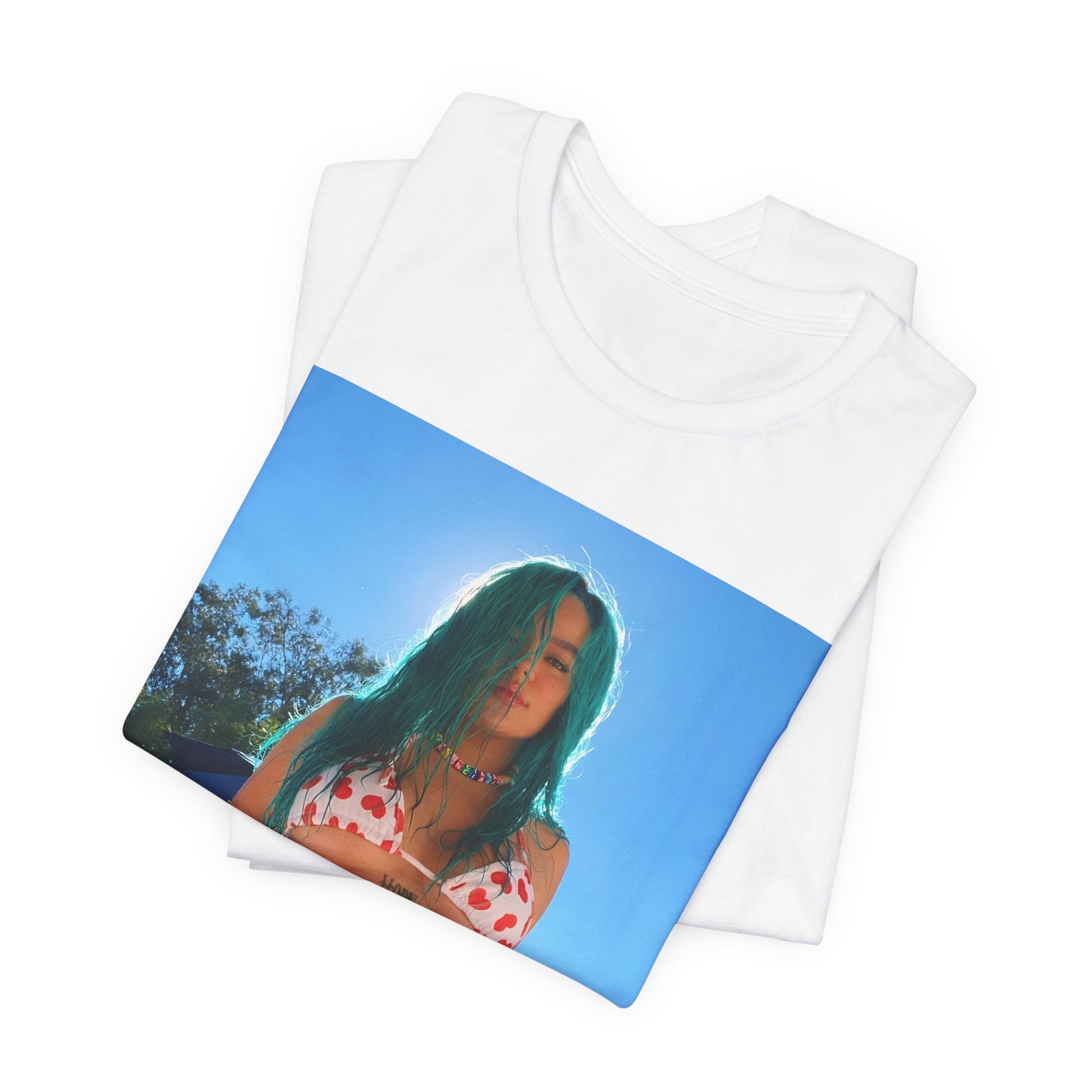 A black graphic t-shirt featuring a graphic of Karol G with sensual vibes.