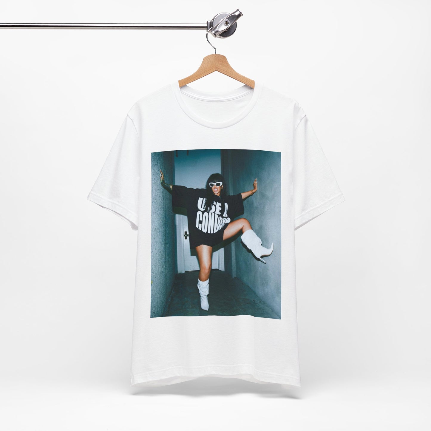 A black graphic t-shirt featuring a modern pop essential graphic of Rihanna.