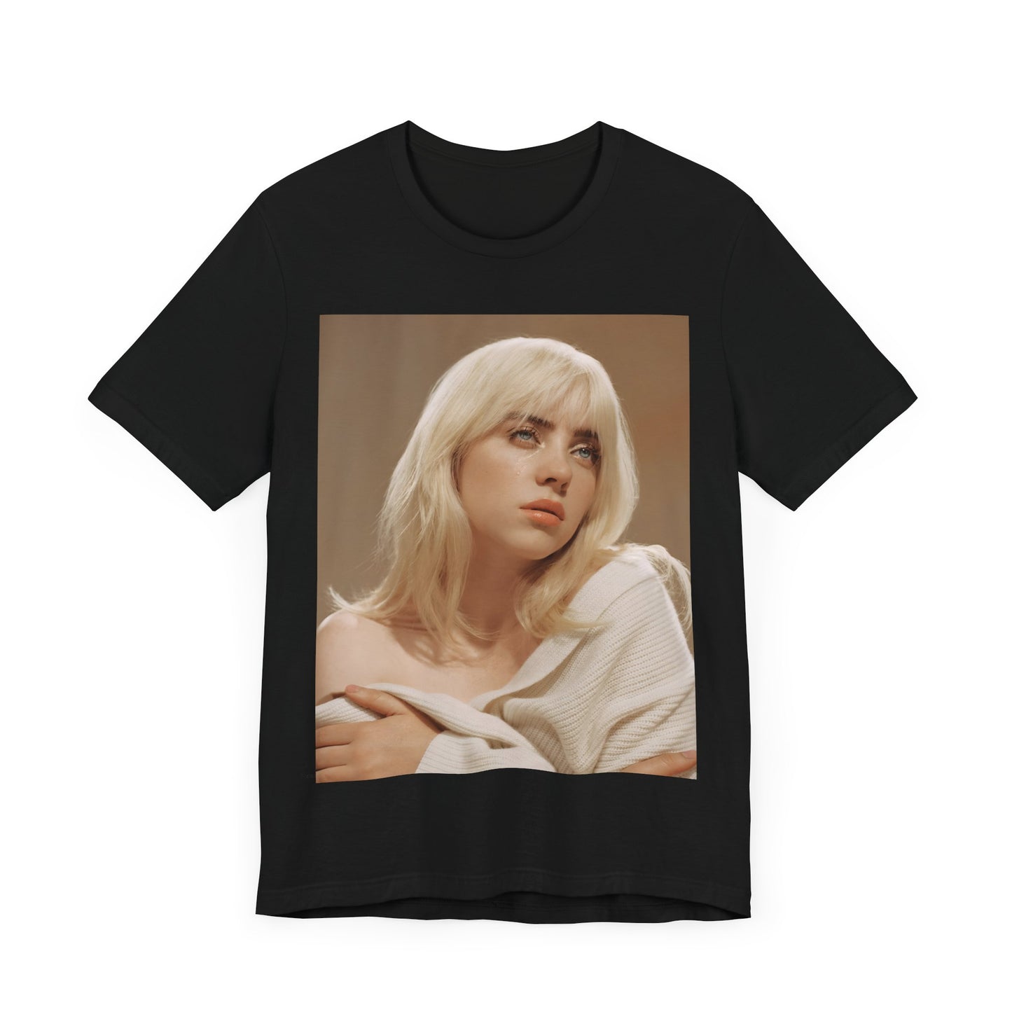 The iconic visual of Billie Eilish with black tears streaming down her face from the 'when the party's over' music video, printed on a t-shirt.