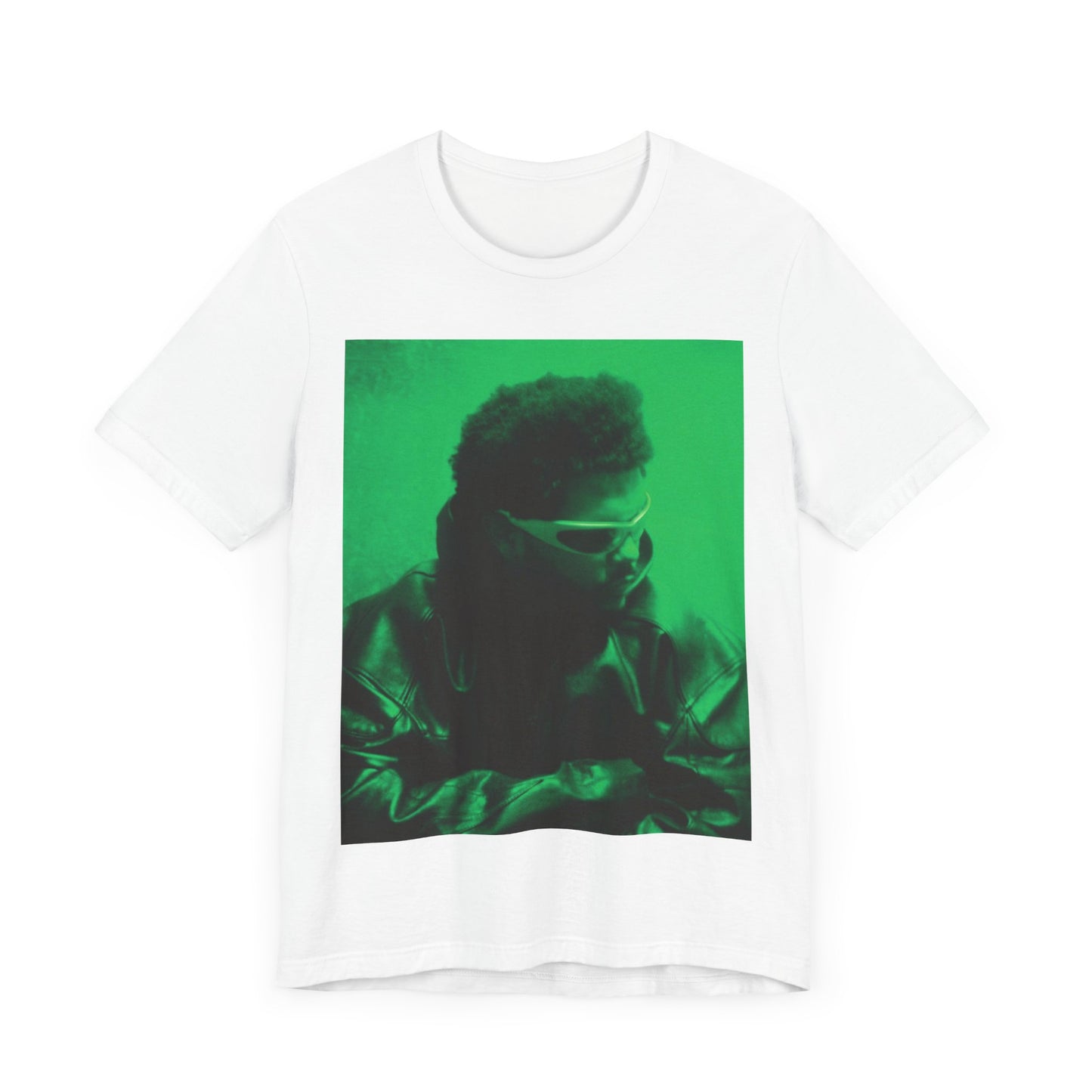 A black graphic t-shirt featuring a vintage graphic related to The Weeknd's 'Kiss Land' era.