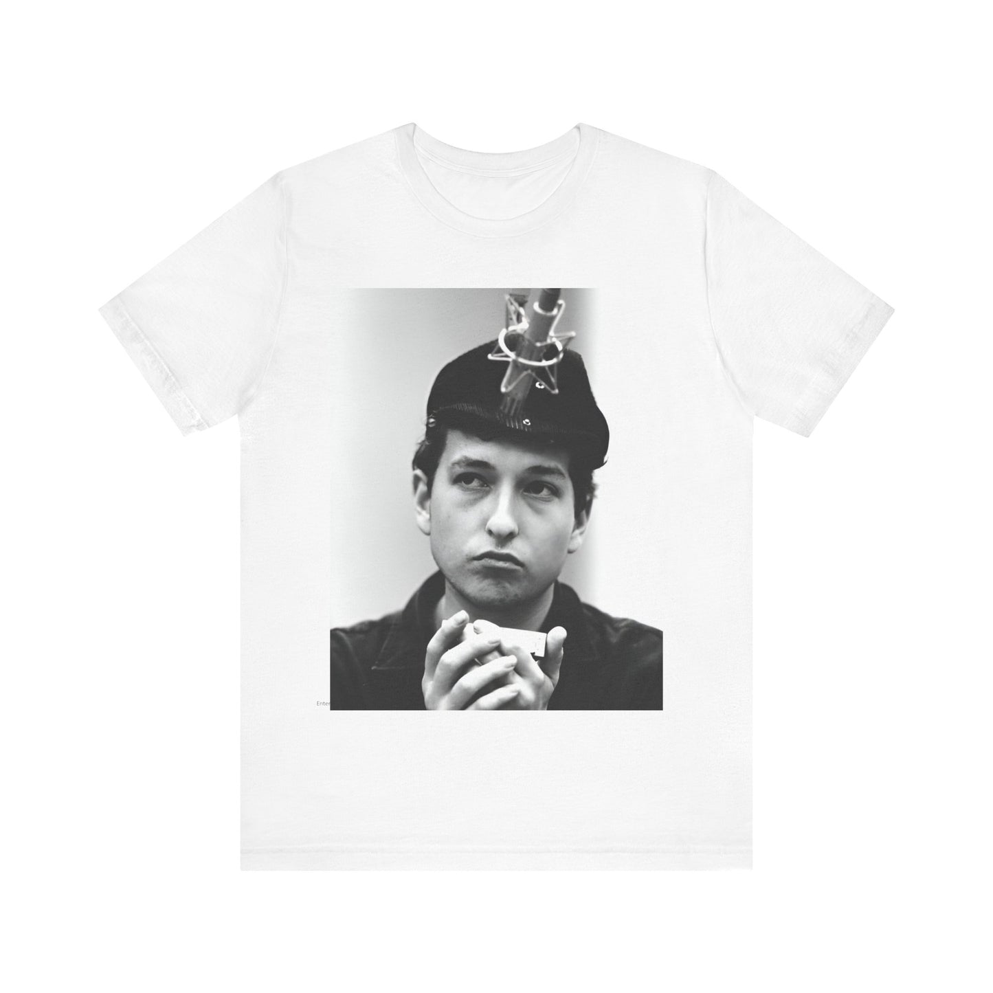 A black graphic t-shirt featuring a graphic of Bob Dylan in an acoustic session setting, possibly with his guitar.