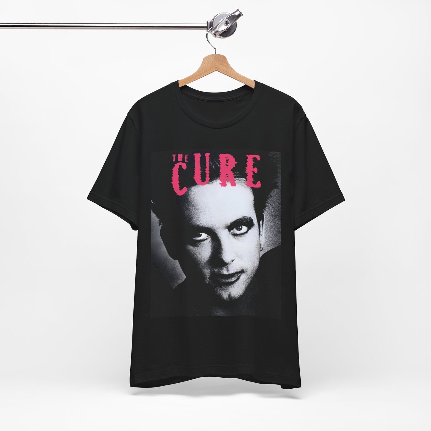 A black graphic t-shirt featuring an 80s post-punk aesthetic graphic of The Cure.