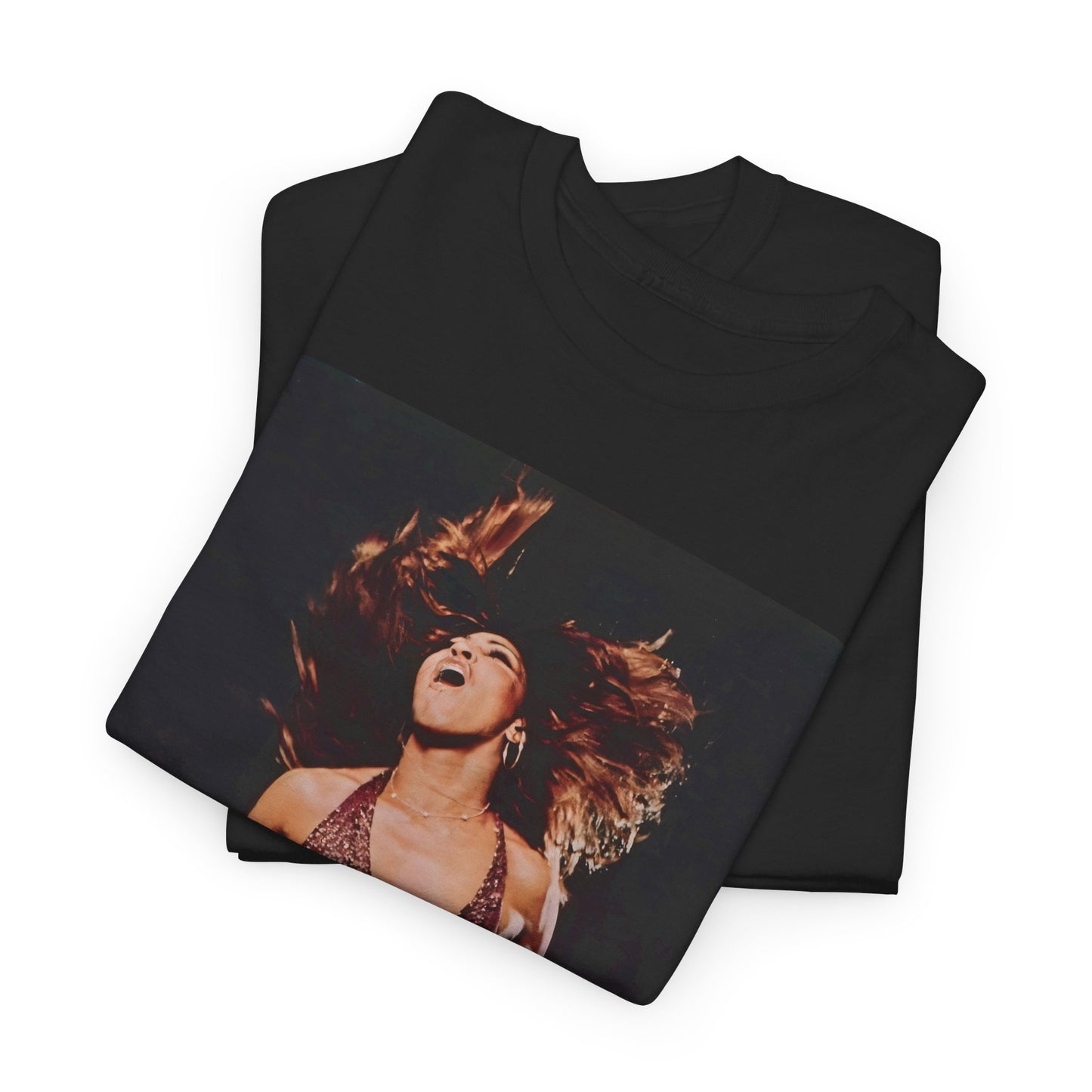 A black graphic t-shirt featuring an authentic live performance graphic of Tina Turner.